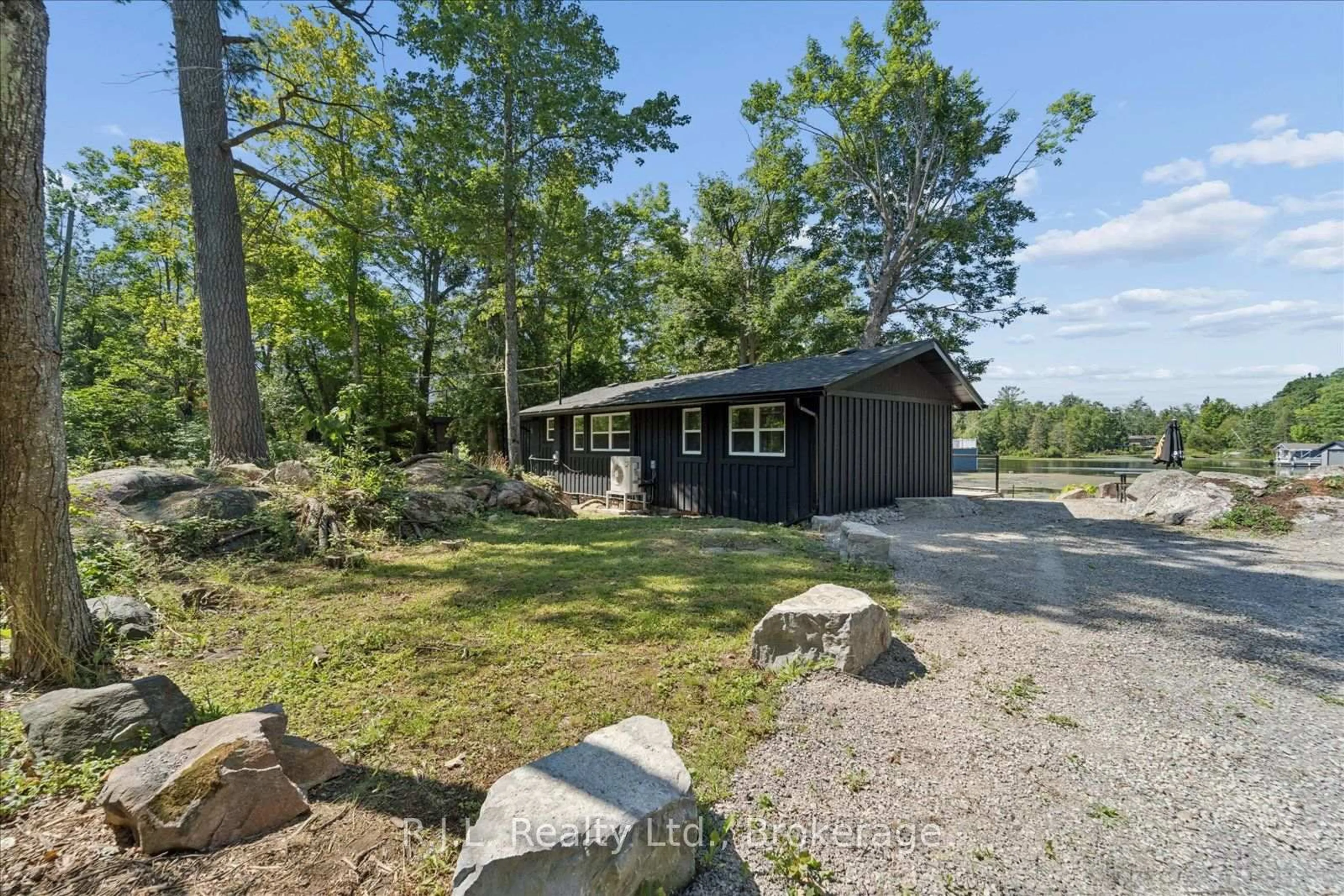 A pic from outside/outdoor area/front of a property/back of a property/a pic from drone, water/lake/river/ocean view for 14 Deer Bay Reach Rd, Trent Lakes Ontario K0L 1J0