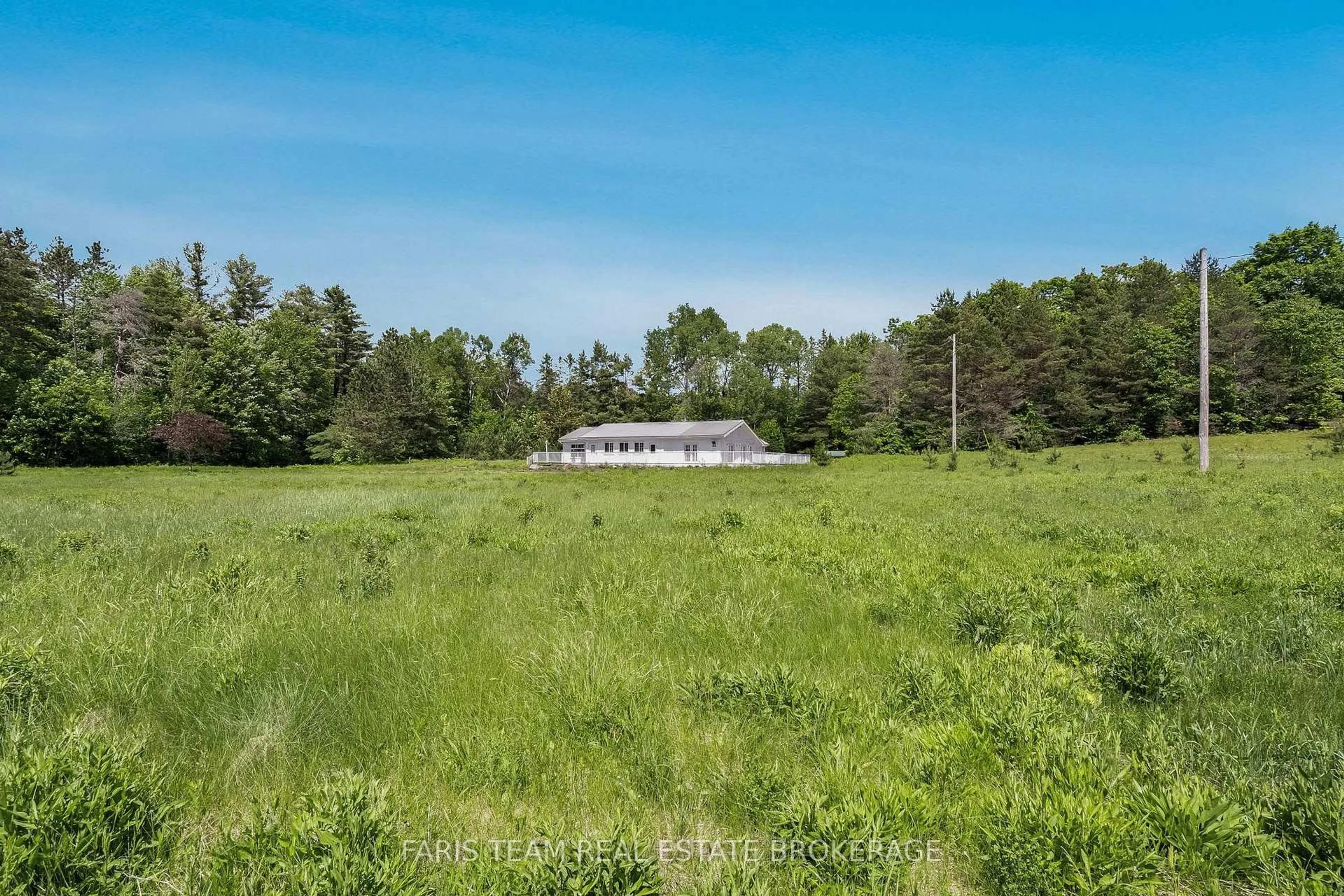 A pic from outside/outdoor area/front of a property/back of a property/a pic from drone, unknown for 2180-2186 Highway 141, Muskoka Lakes Ontario P0B 1L0