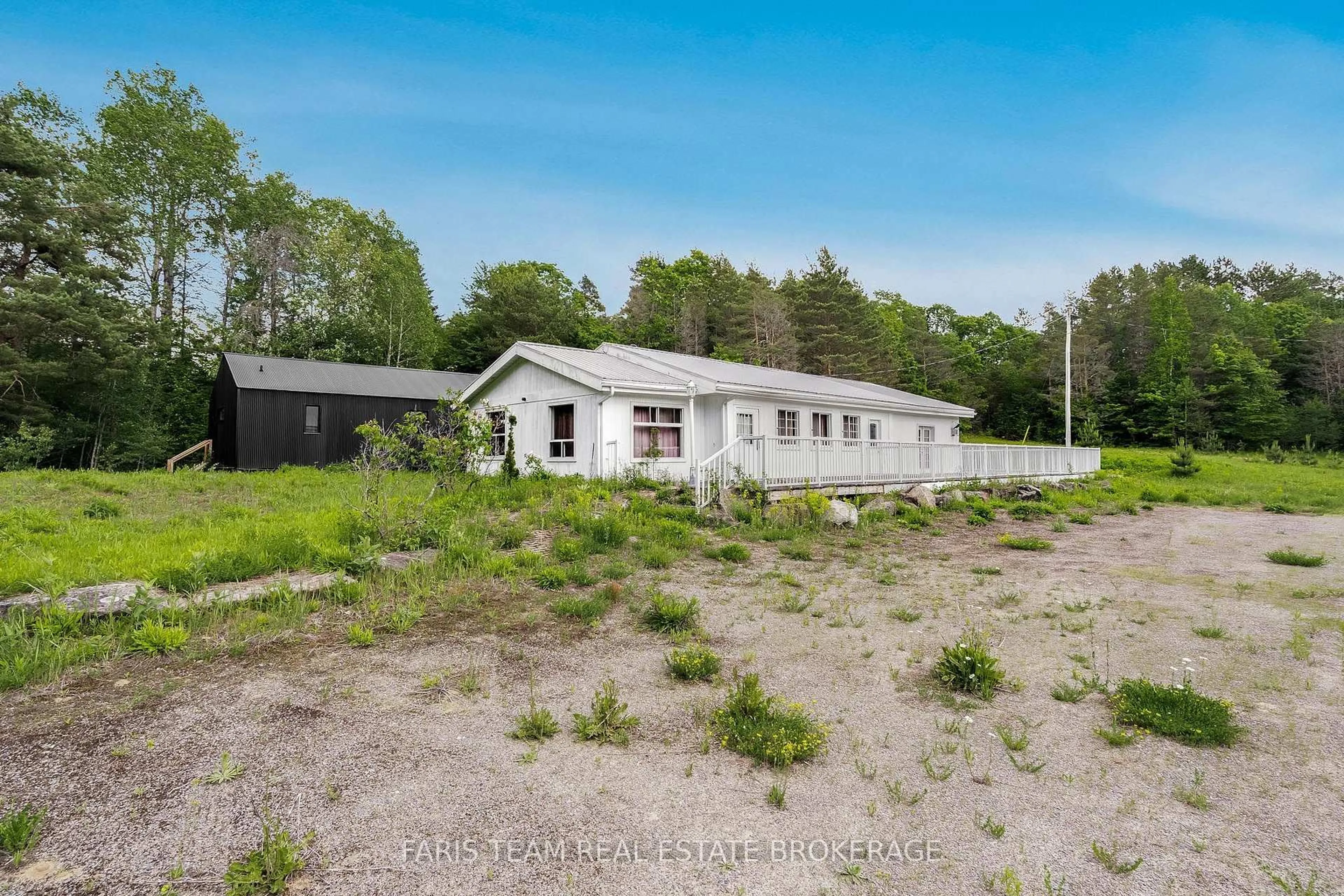 A pic from outside/outdoor area/front of a property/back of a property/a pic from drone, building for 2180-2186 Highway 141, Muskoka Lakes Ontario P0B 1L0