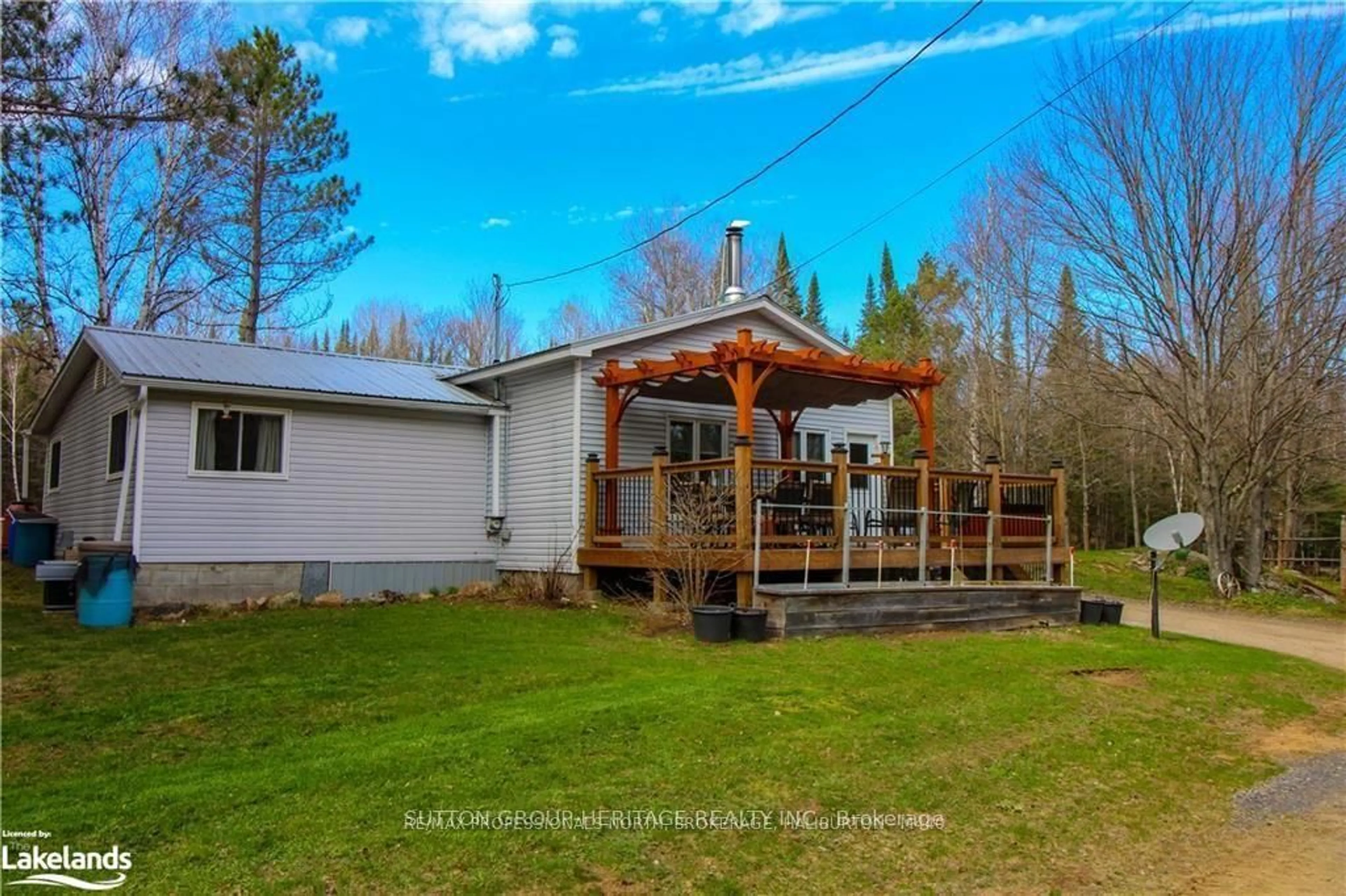 A pic from outside/outdoor area/front of a property/back of a property/a pic from drone, water/lake/river/ocean view for 1241 One Mile Dr, Minden Hills Ontario K0M 2K0