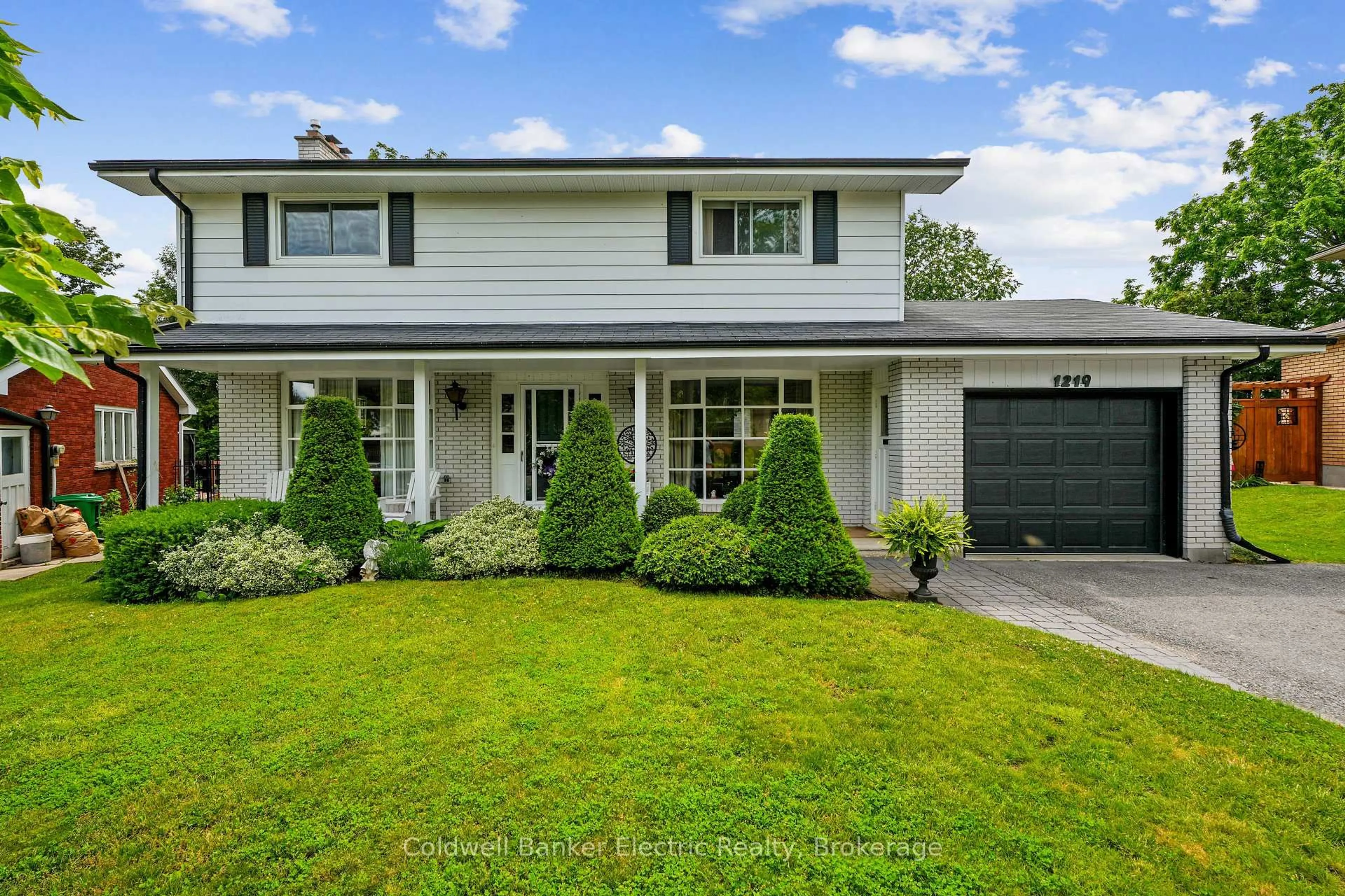 Home with vinyl exterior material, street for 1219 Edmison Dr, Peterborough Ontario K9H 6V2