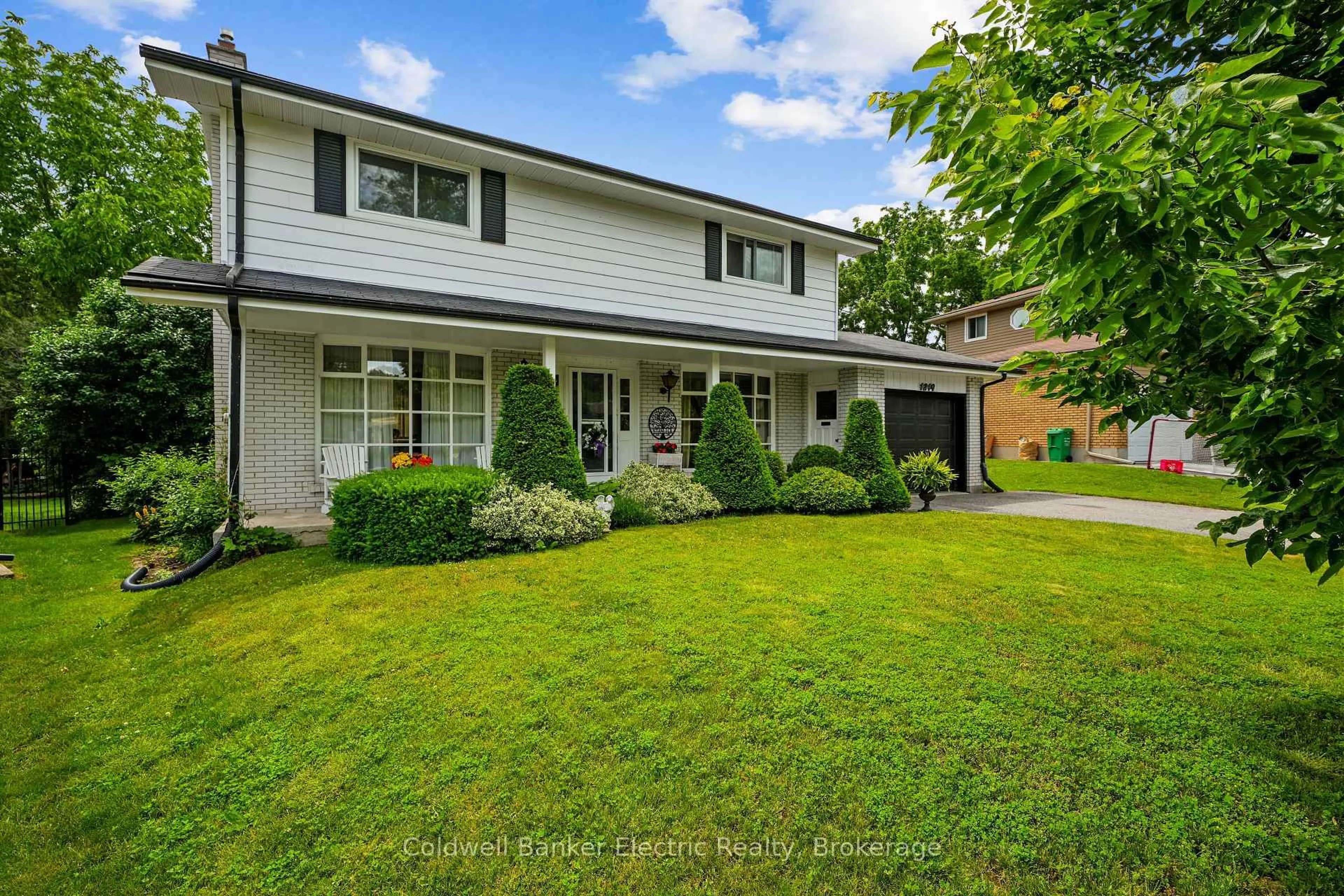 Home with brick exterior material, street for 1219 Edmison Dr, Peterborough Ontario K9H 6V2