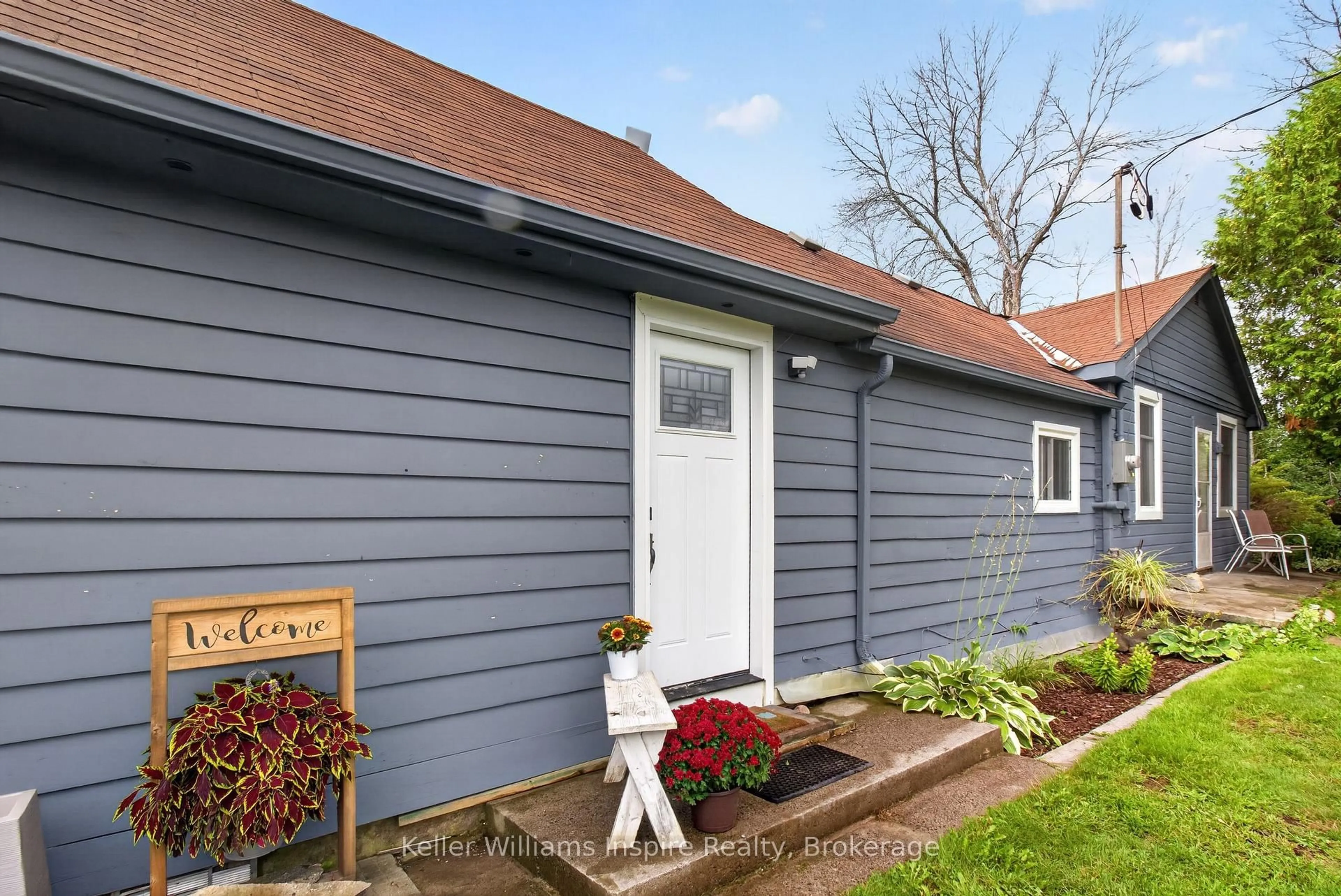 Home with vinyl exterior material, street for 7968 County 2 Rd, Napanee Ontario K7R 3K6