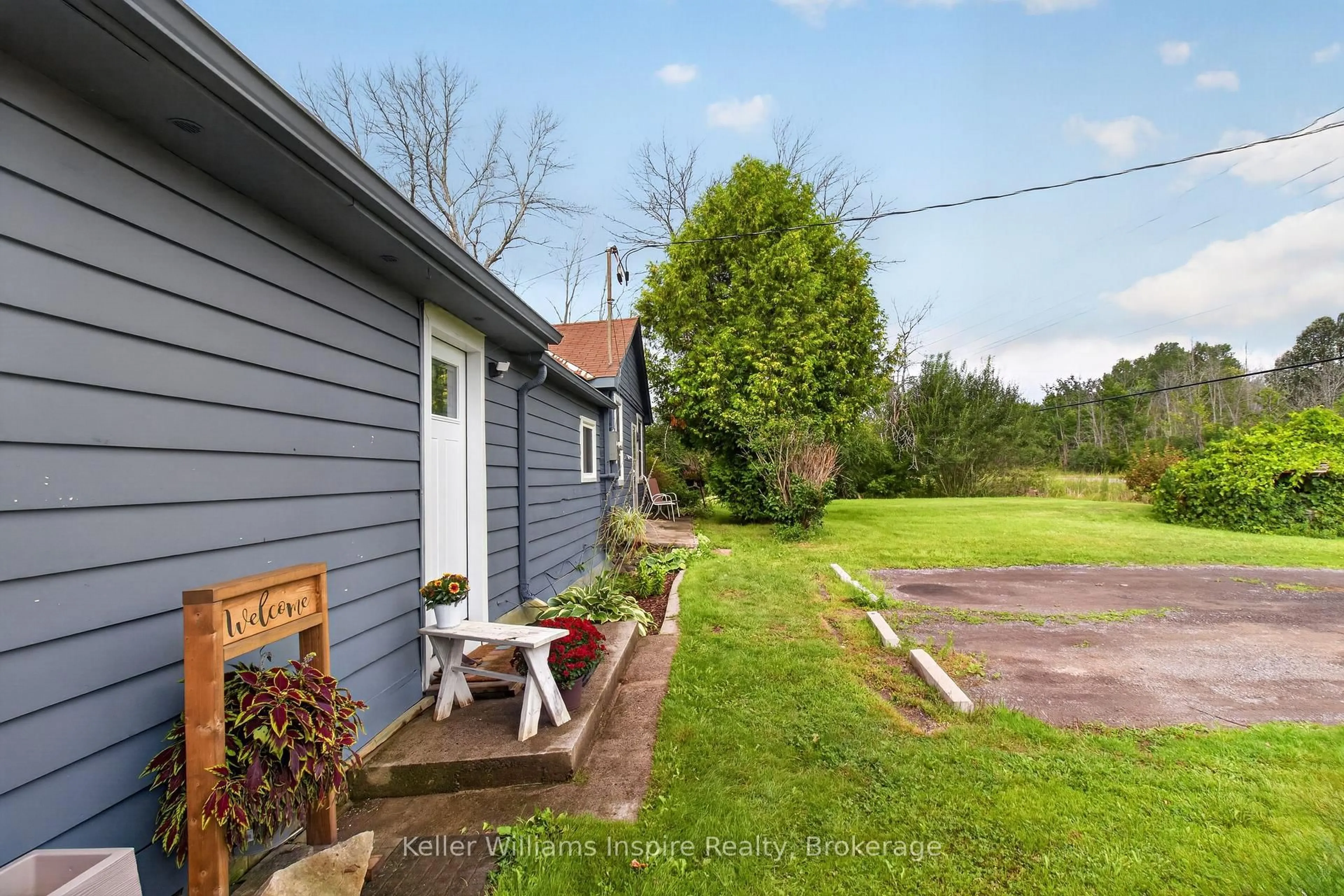 A pic from outside/outdoor area/front of a property/back of a property/a pic from drone, street for 7968 County 2 Rd, Napanee Ontario K7R 3K6