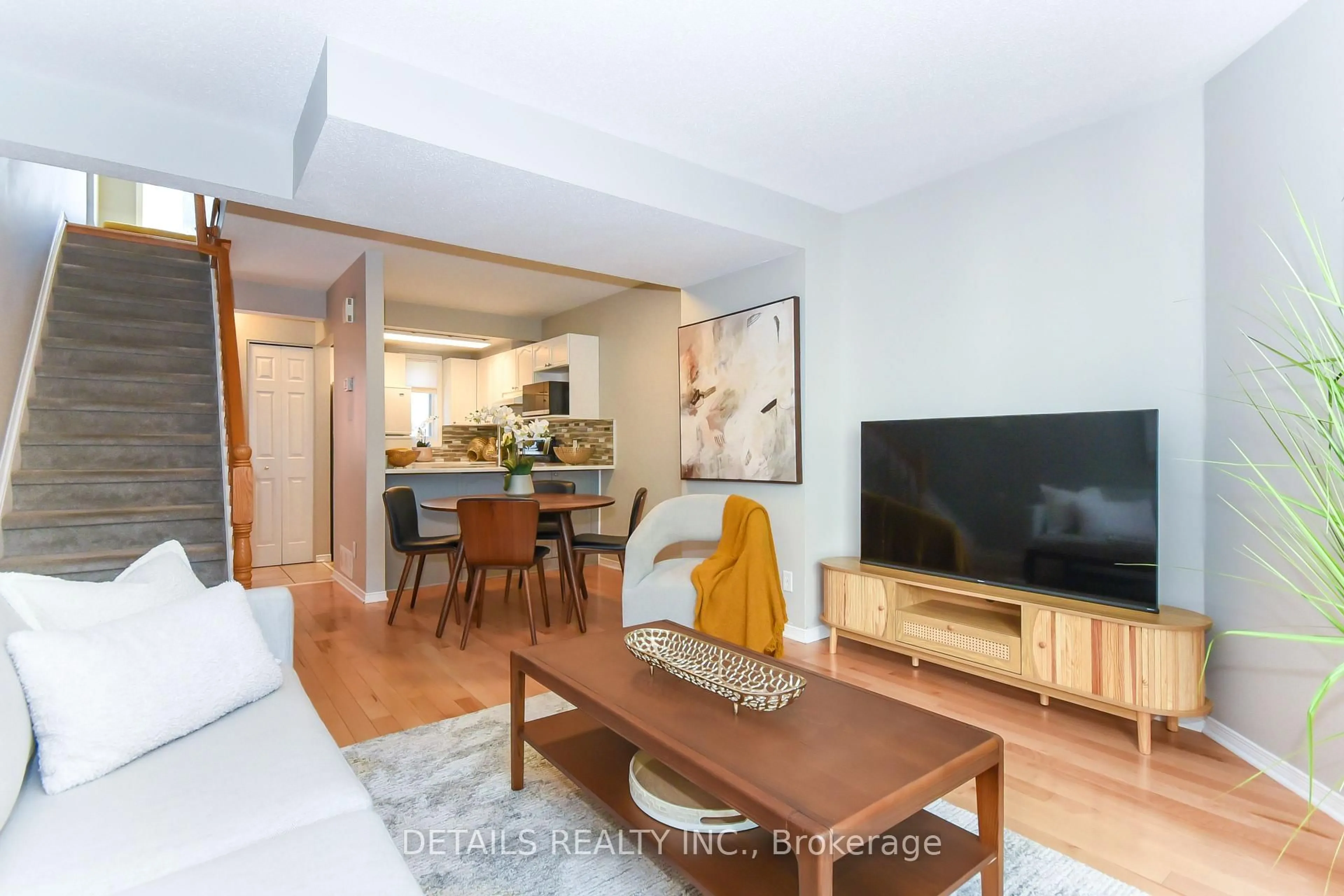Living room with furniture, wood/laminate floor for 158 Forward Ave, Ottawa Ontario K1Y 1K9