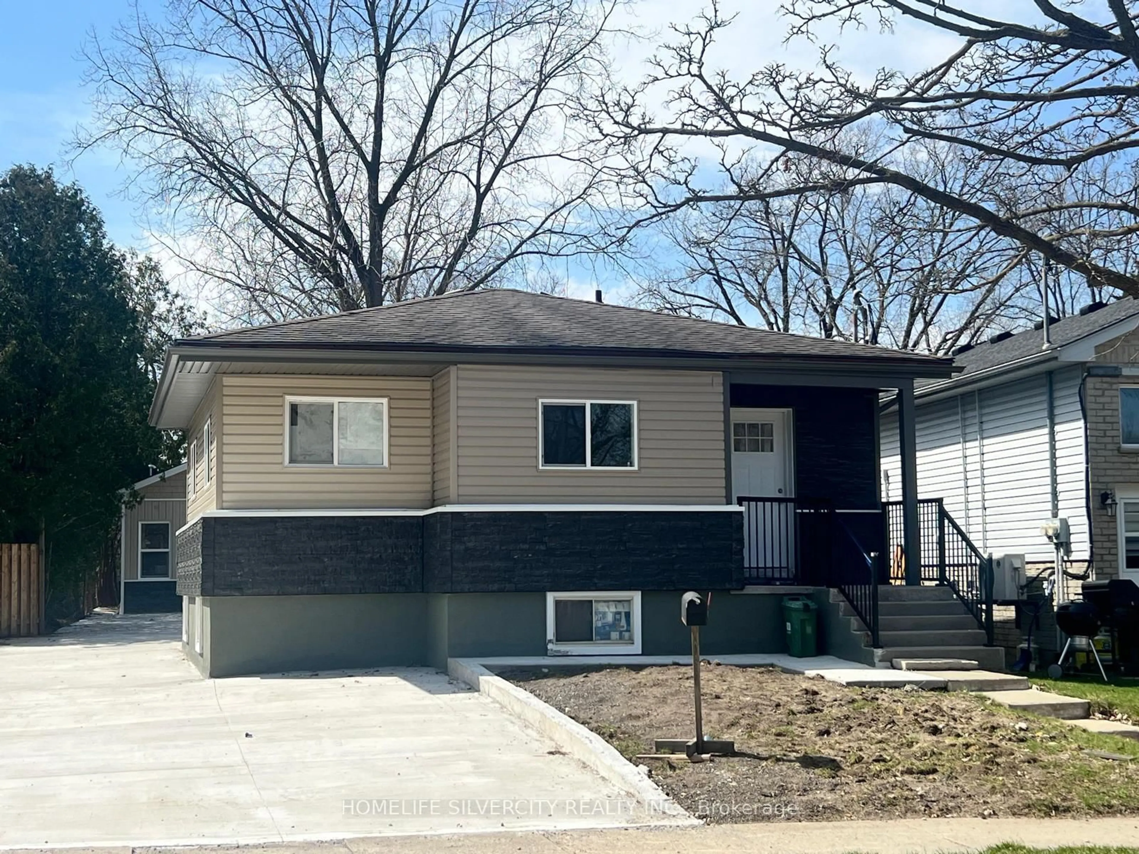 Home with vinyl exterior material, street for 221 Emerson Ave, London South Ontario N5V 3L5
