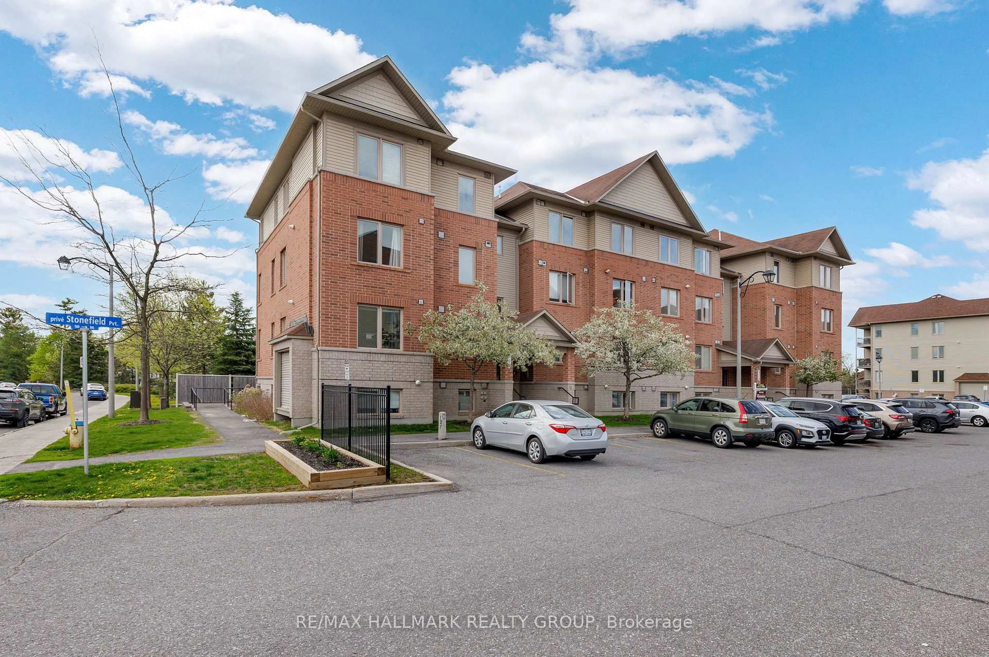 A pic from outside/outdoor area/front of a property/back of a property/a pic from drone, street for 500 Stonefield Private #6, Ottawa Ontario K2G 4R3
