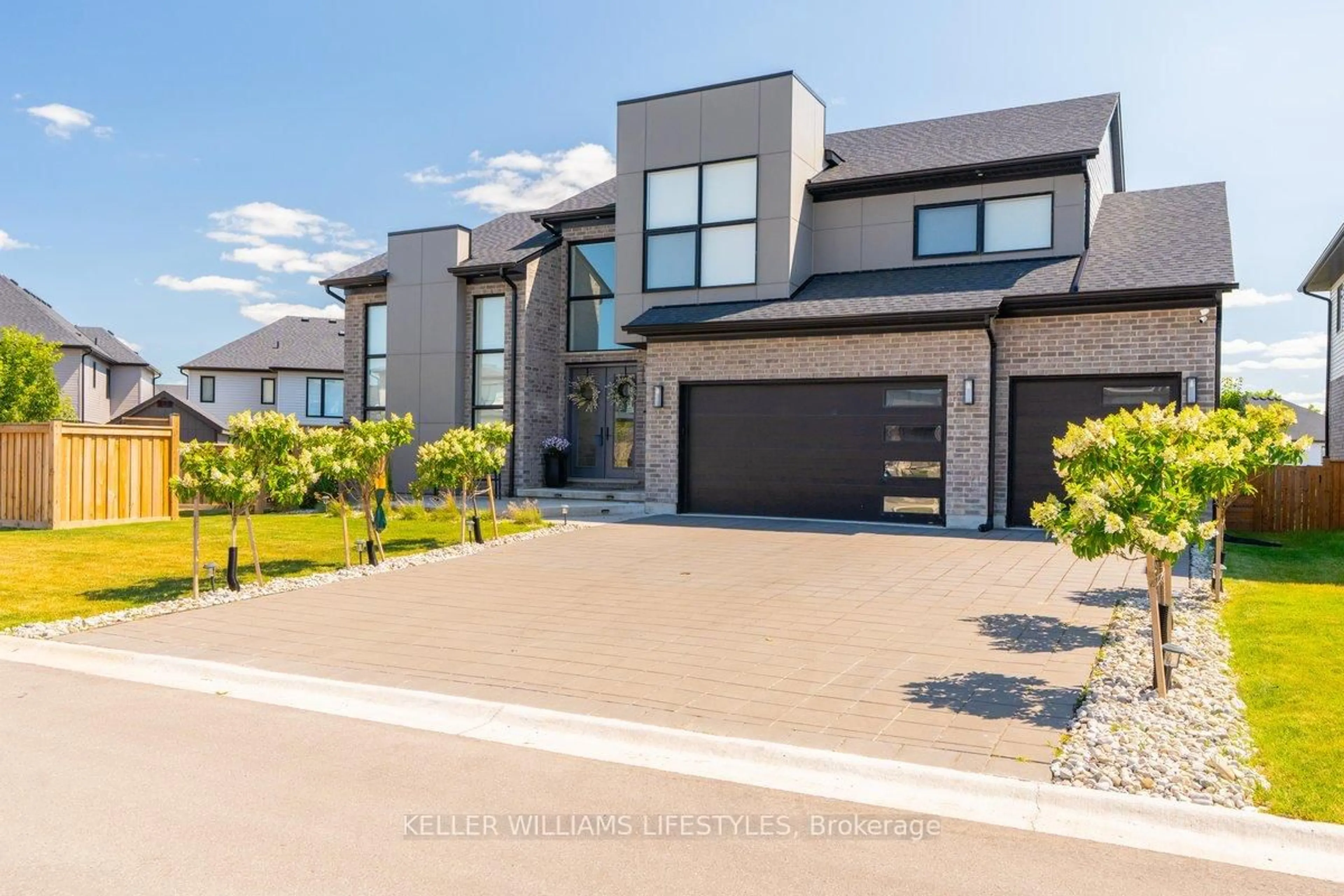 Home with brick exterior material, street for 21 Locky Lane, Middlesex Centre Ontario N0L 1R0