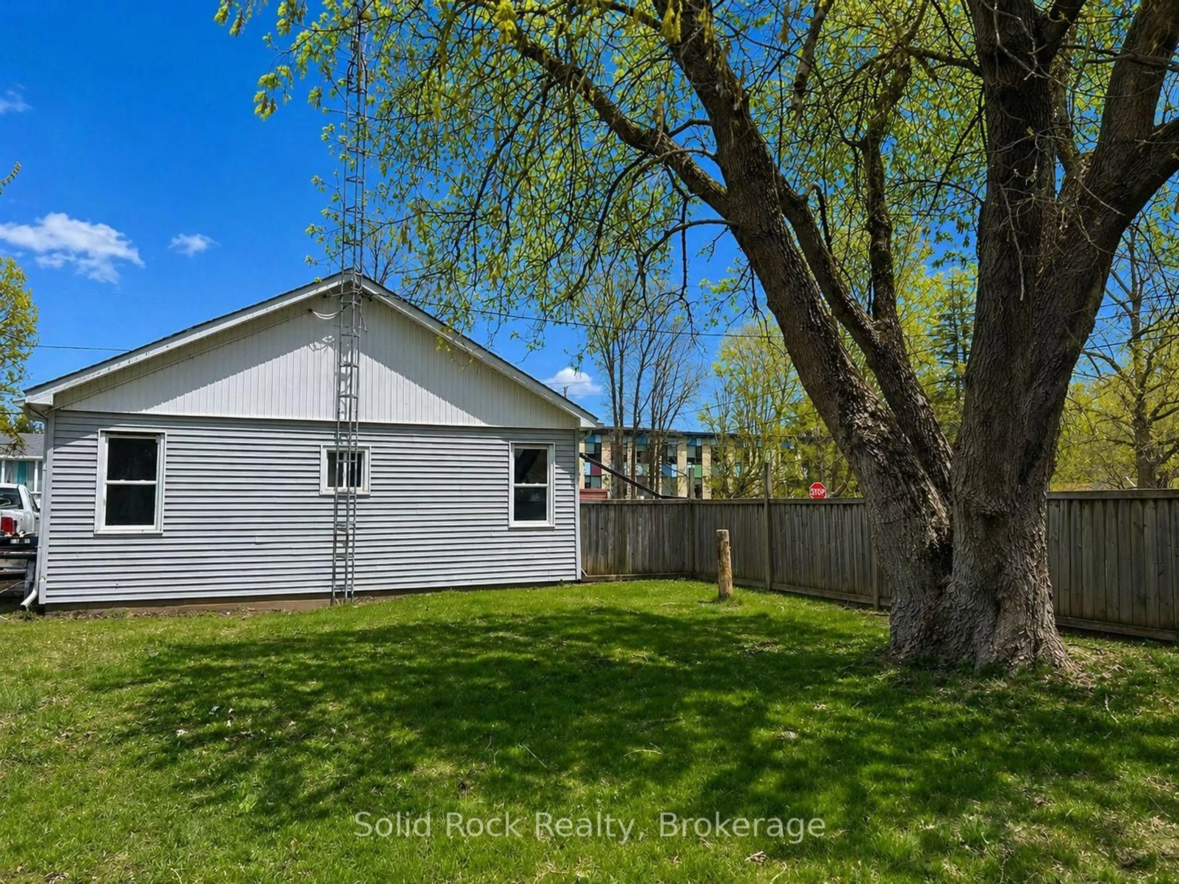 A pic from outside/outdoor area/front of a property/back of a property/a pic from drone, street for 14 Linn St, Limoges Ontario K0K 2M0