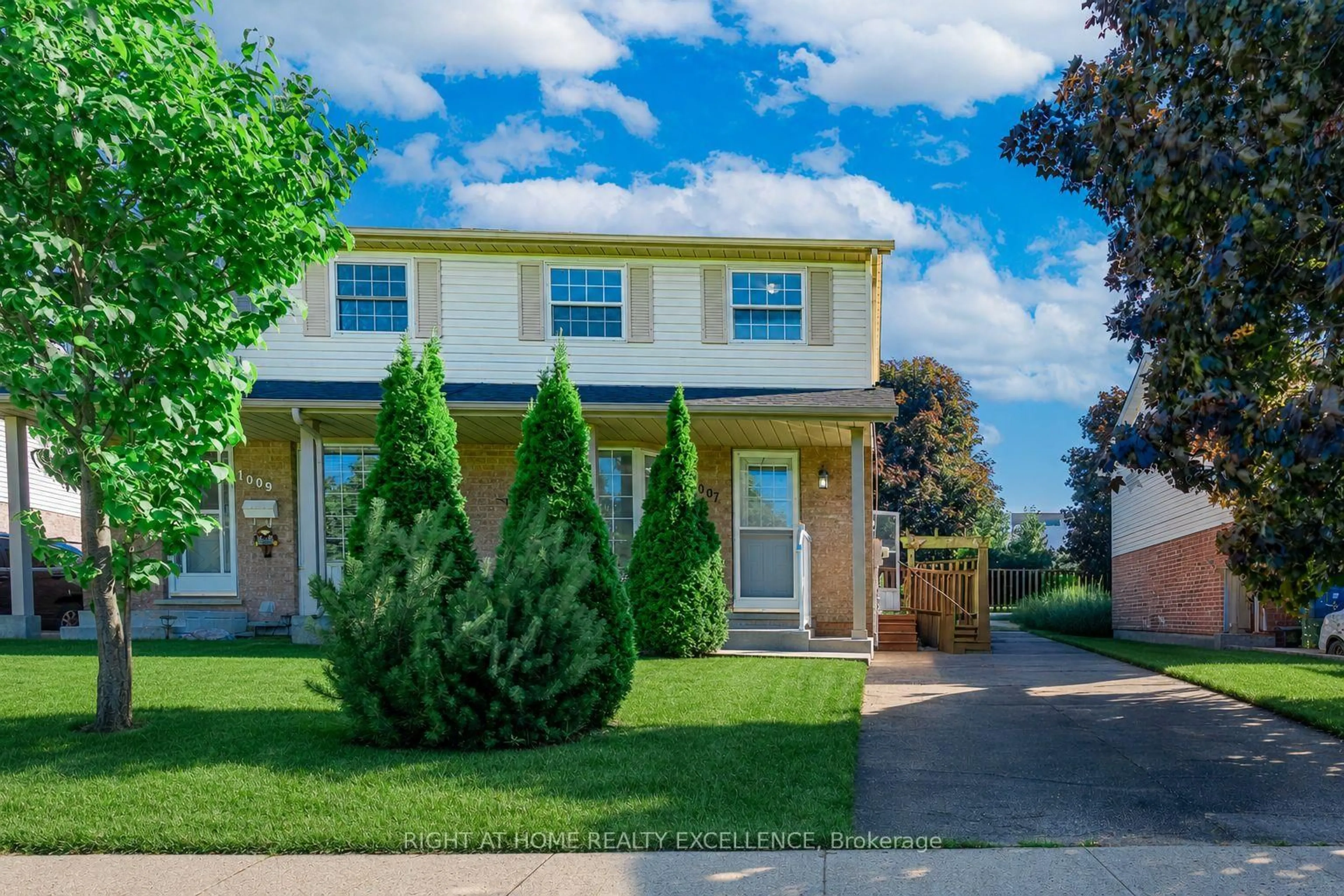 Home with vinyl exterior material, street for 1007 ELGIN St, Cambridge Ontario N1R 8J4