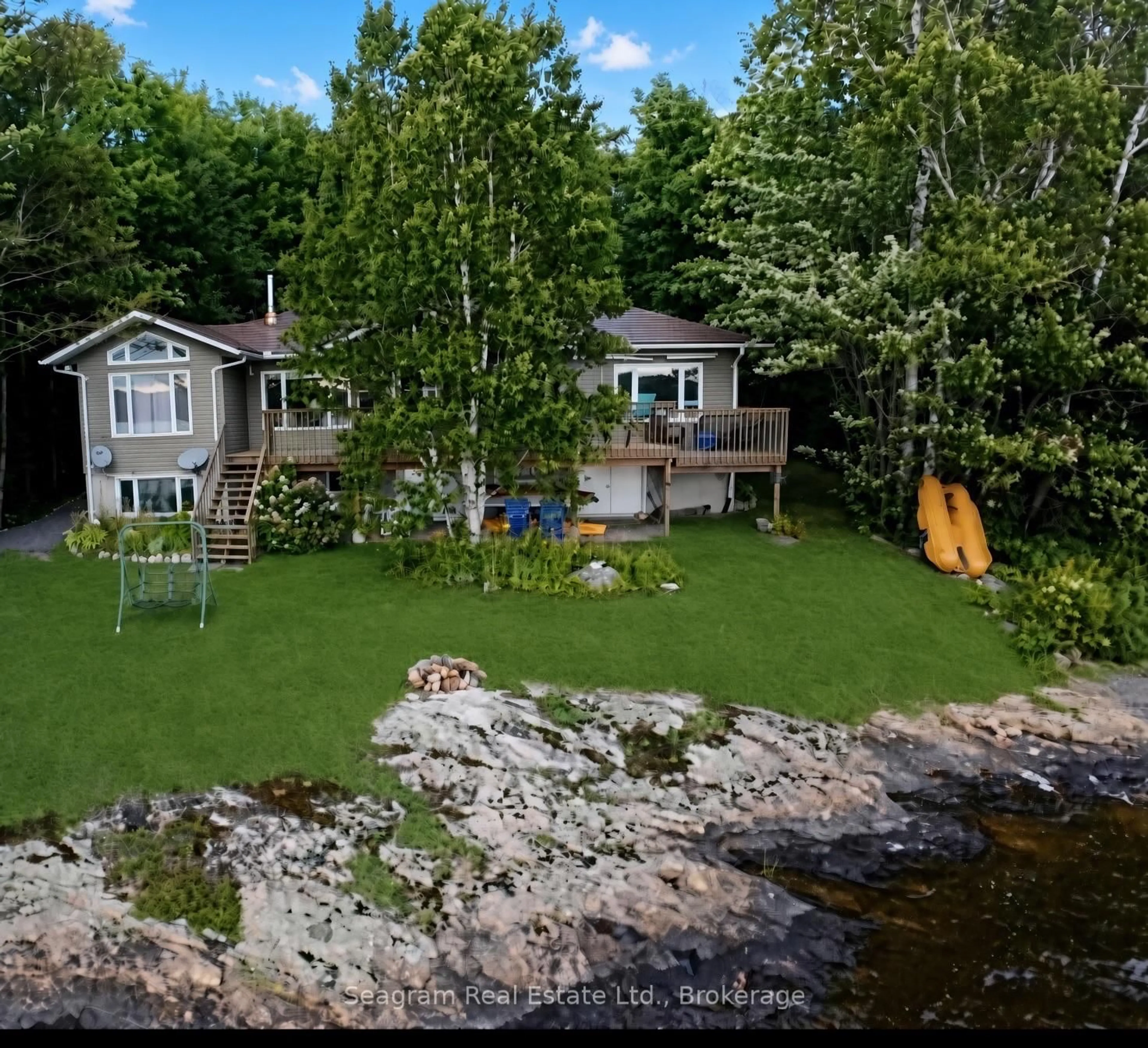 A pic from outside/outdoor area/front of a property/back of a property/a pic from drone, water/lake/river/ocean view for 266 Cheer Lake Rd, Strong Ontario P0A 1Z0