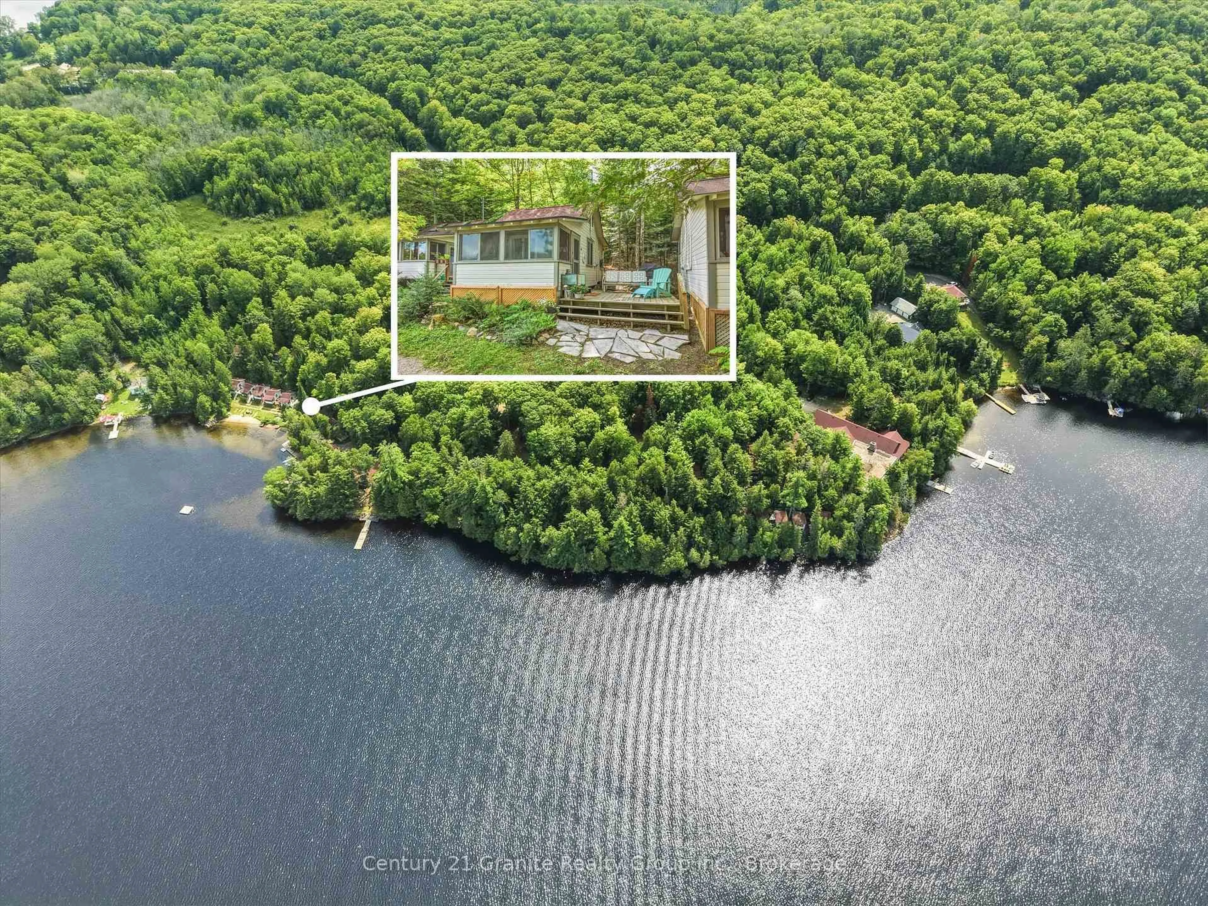A pic from outside/outdoor area/front of a property/back of a property/a pic from drone, water/lake/river/ocean view for 3437 Kashagawigamog Lake Rd, Dysart et al Ontario K0M 1S0