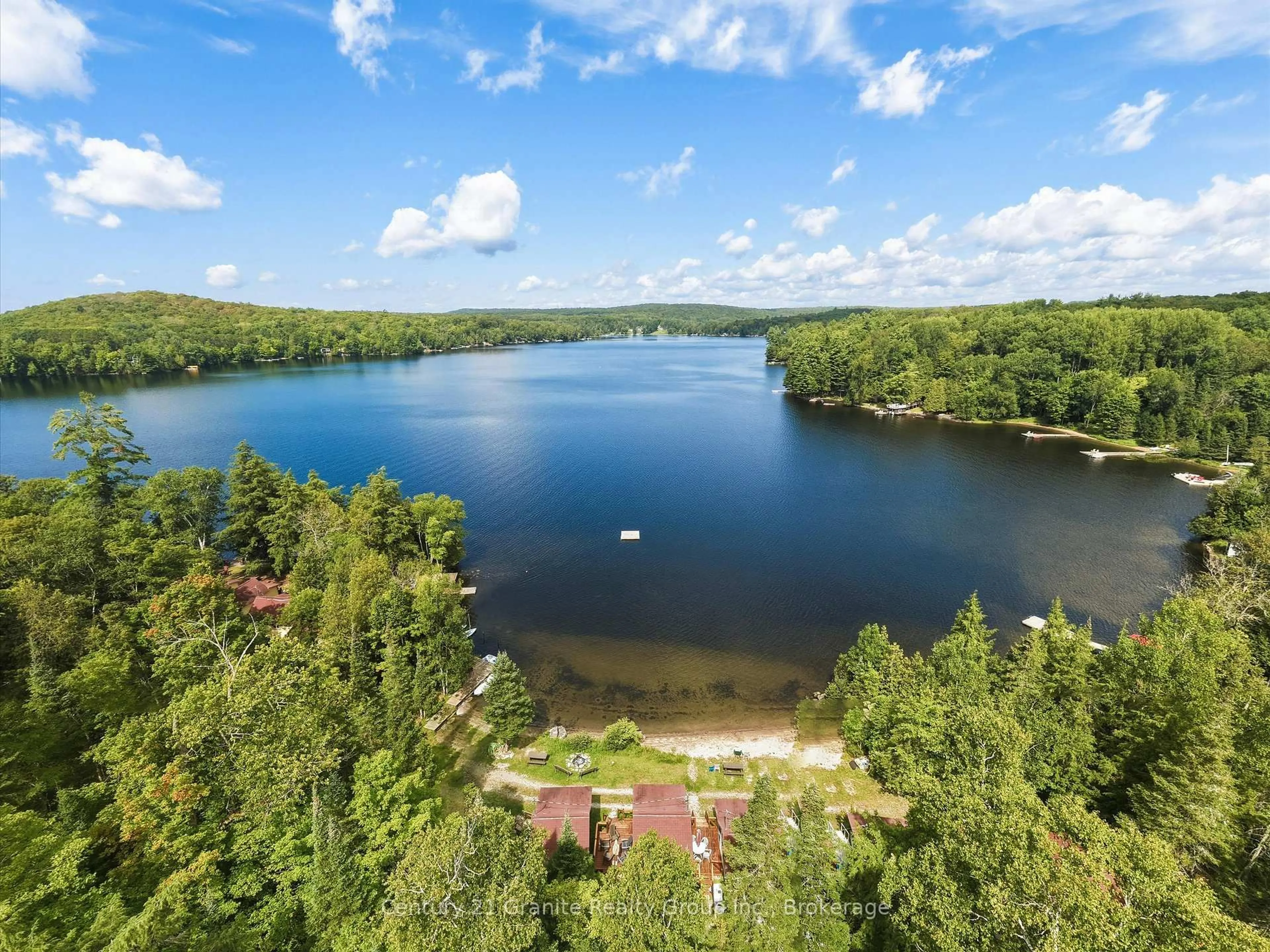 A pic from outside/outdoor area/front of a property/back of a property/a pic from drone, water/lake/river/ocean view for 3437 Kashagawigamog Lake Rd, Dysart et al Ontario K0M 1S0