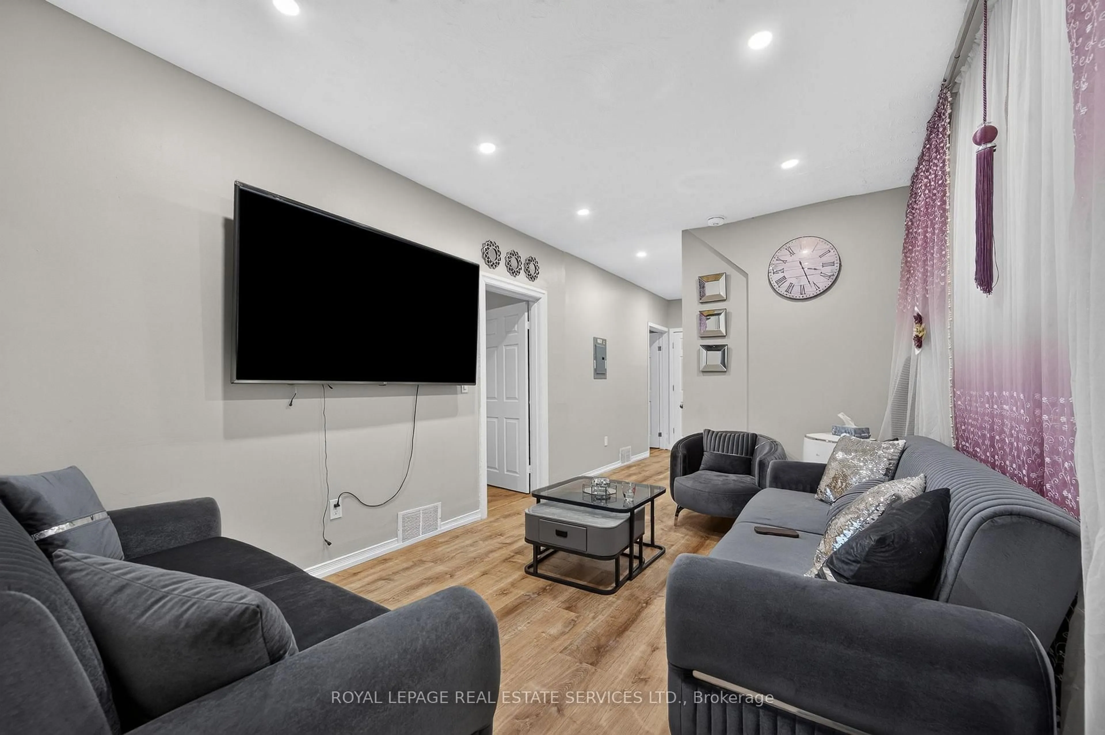 Living room with furniture, unknown for 62 Erie Ave, Hamilton Ontario L8N 2W6