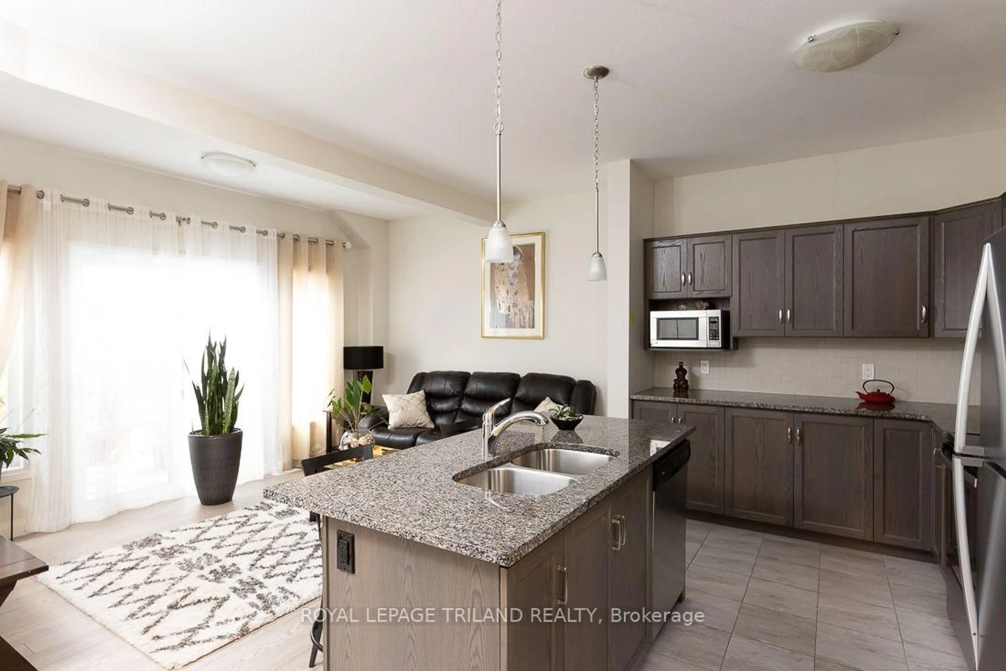 Open concept kitchen, ceramic/tile floor for 2040 Shore Rd #106, London South Ontario N6K 0G3