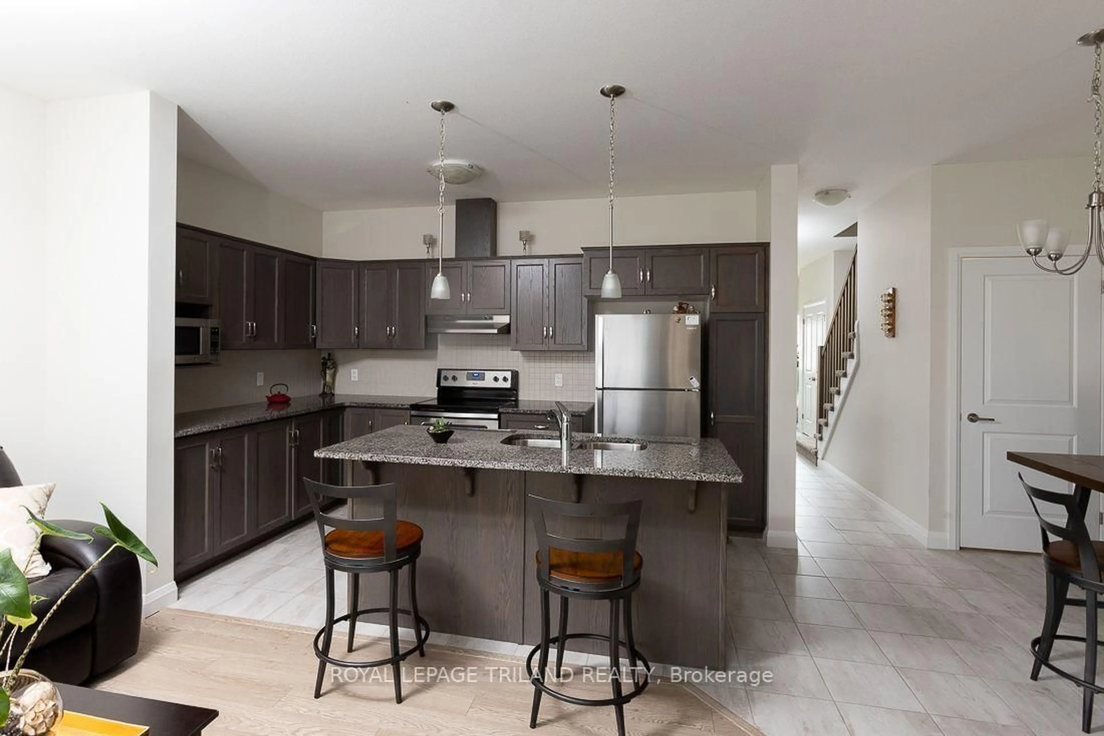 Open concept kitchen, ceramic/tile floor for 2040 Shore Rd #106, London South Ontario N6K 0G3