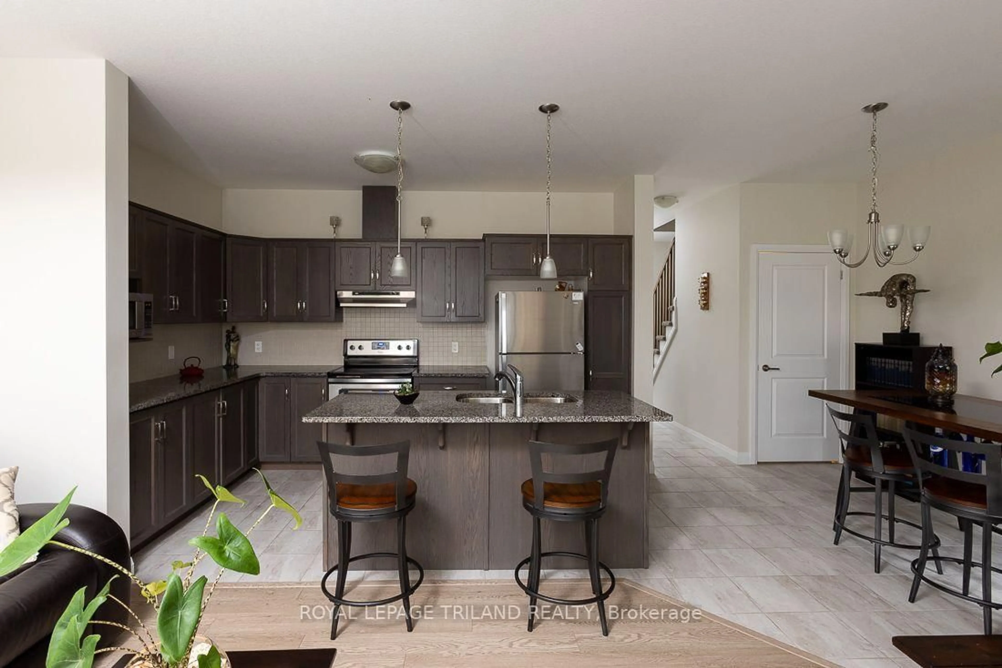Open concept kitchen, ceramic/tile floor for 2040 Shore Rd #106, London South Ontario N6K 0G3