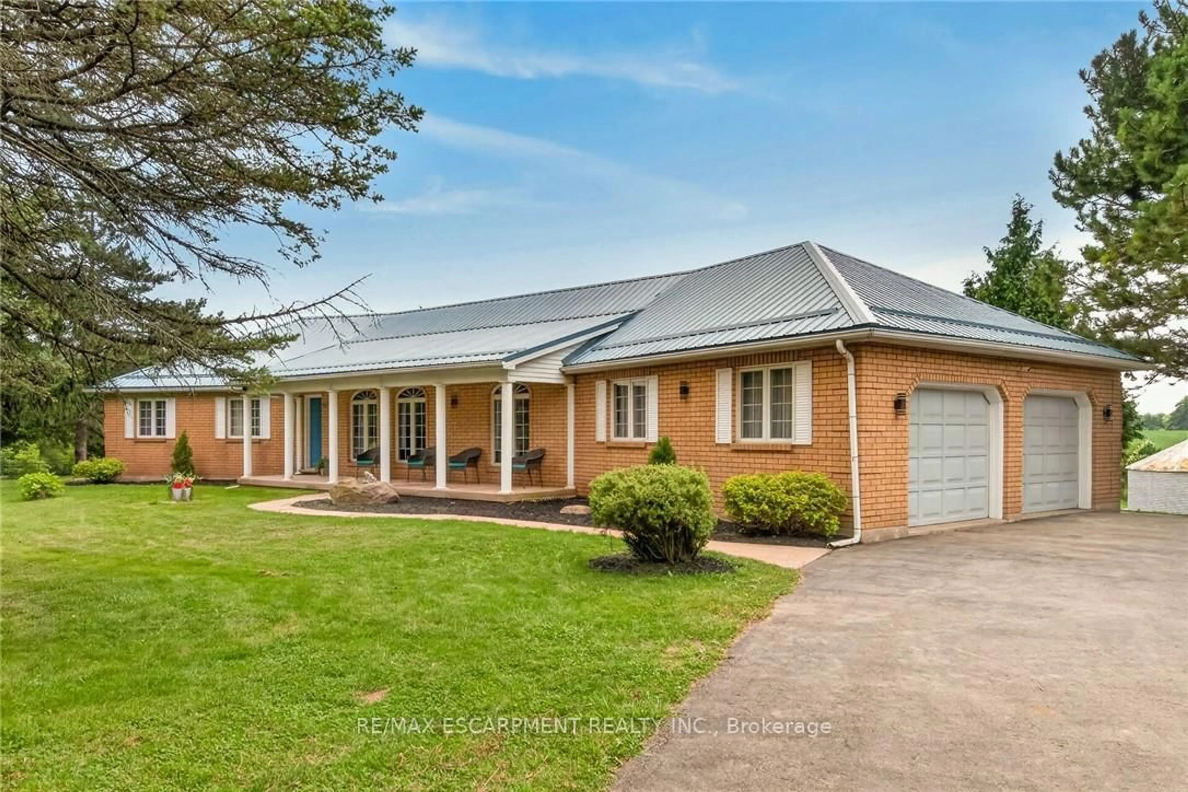 Home with brick exterior material, street for 7011 Dickenson Rd, Hamilton Ontario L0R 1W0