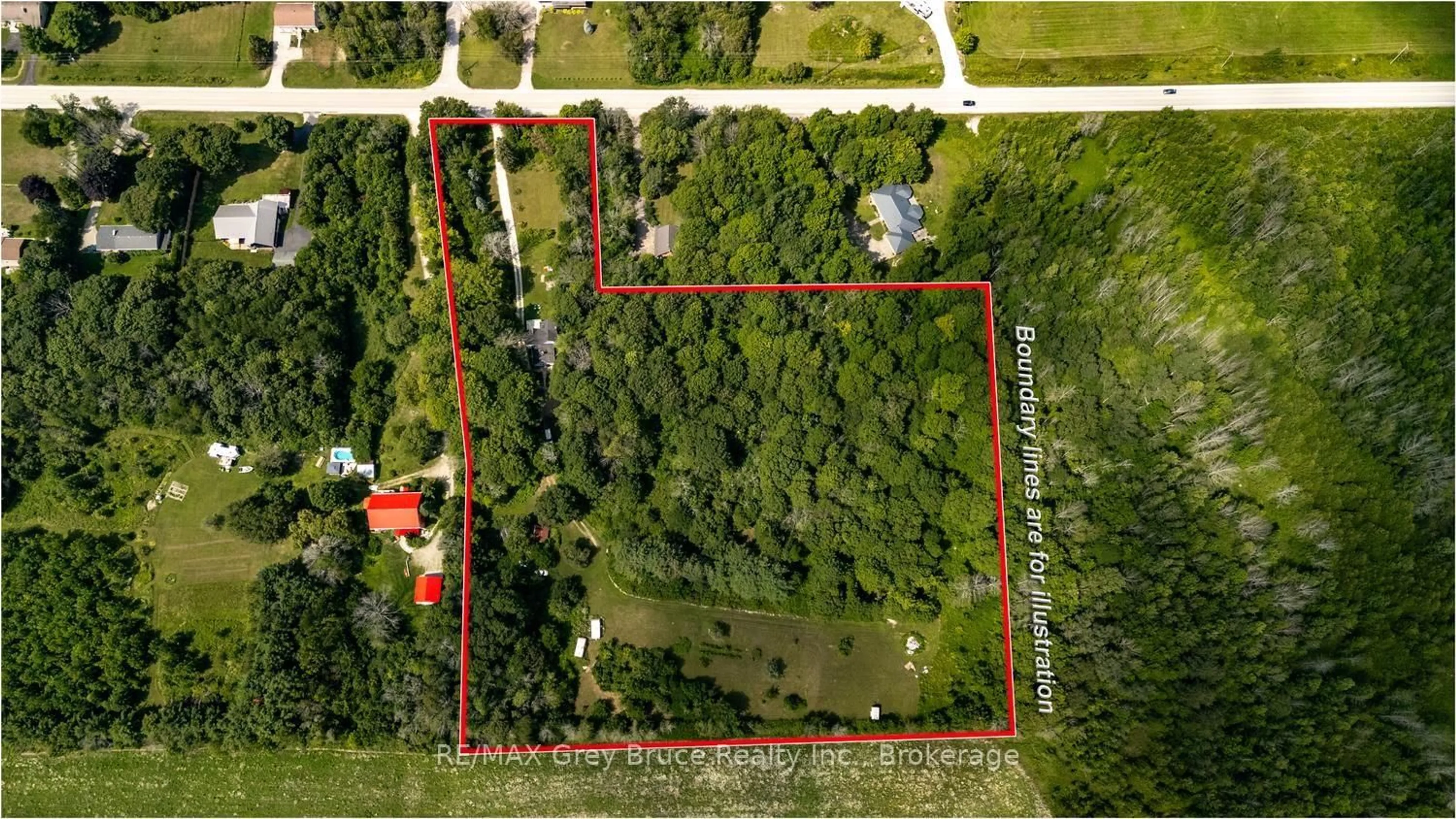 A pic from outside/outdoor area/front of a property/back of a property/a pic from drone, unknown for 501306 Grey 1 Rd, Georgian Bluffs Ontario N0H 2T0