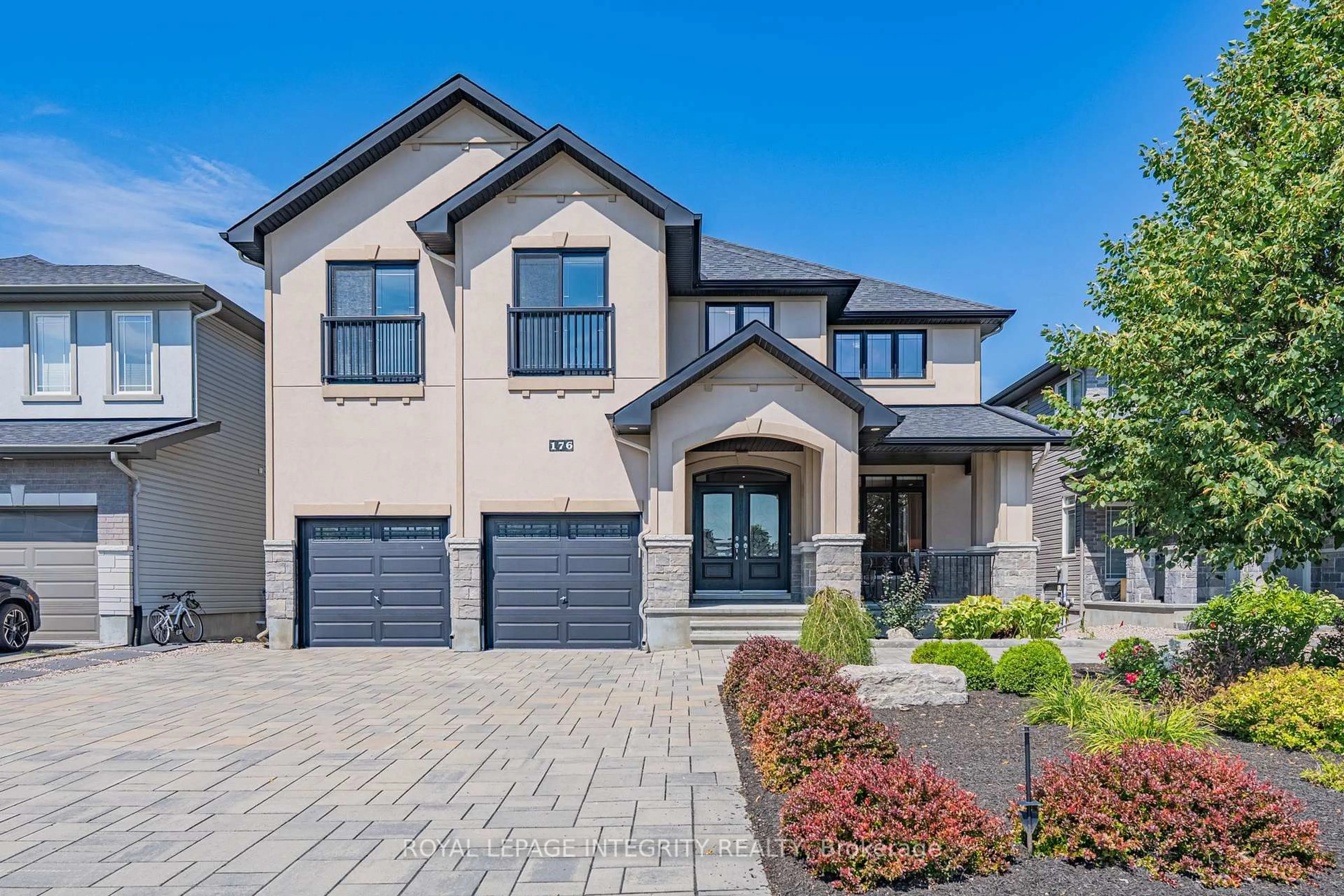 Home with brick exterior material, street for 176 ESCARPMENT Cres, Kanata Ontario K2T 0L7