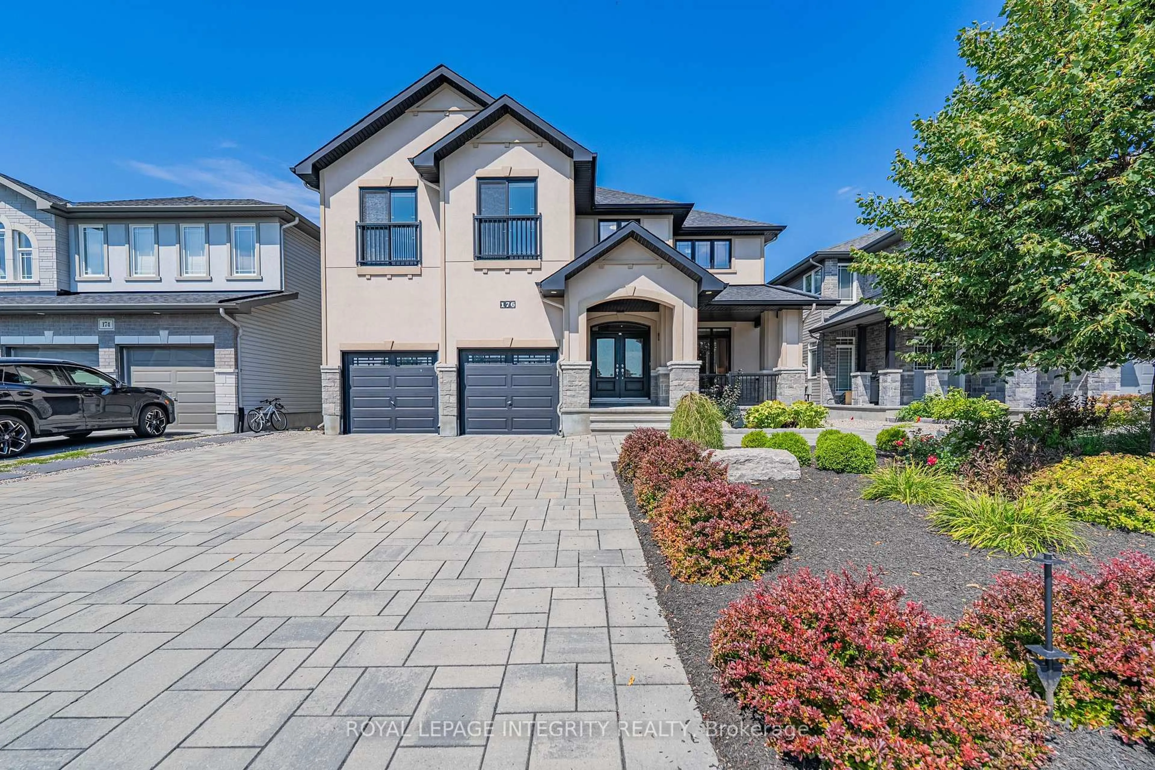 Home with brick exterior material, street for 176 ESCARPMENT Cres, Kanata Ontario K2T 0L7