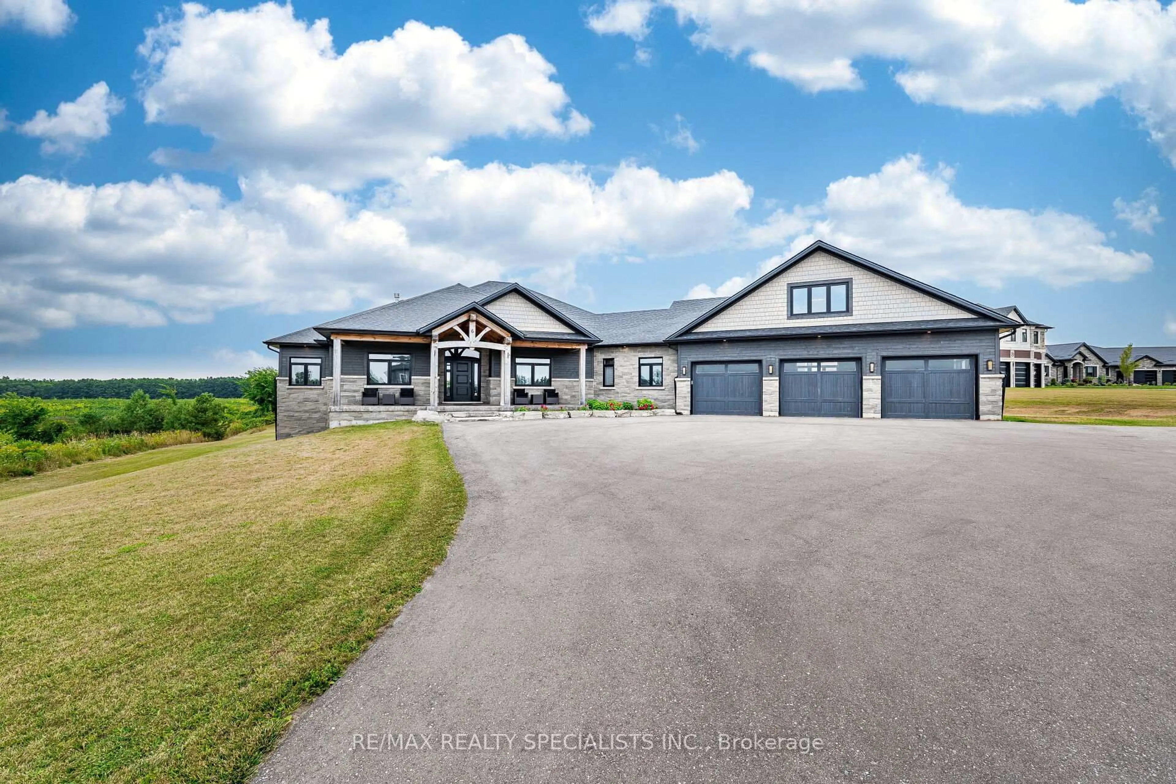 A pic from outside/outdoor area/front of a property/back of a property/a pic from drone, unknown for 6 Rutledge Hts, Melancthon Ontario L9V 3M9