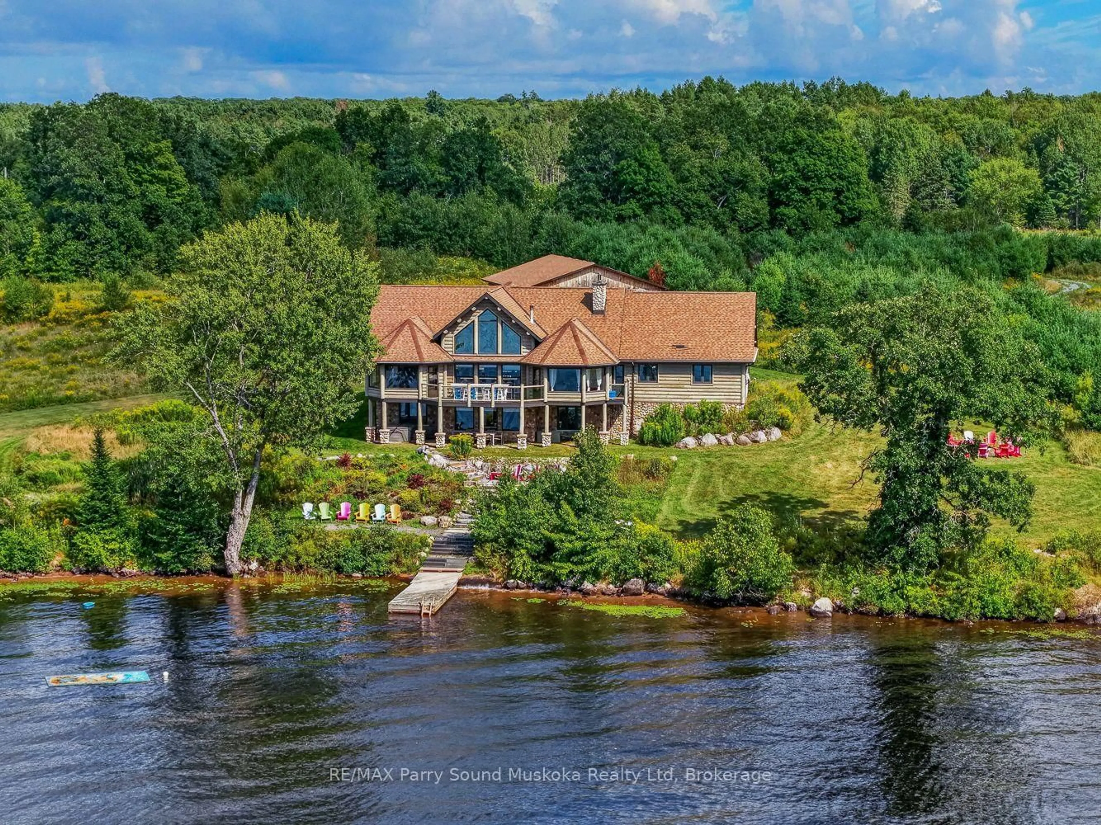 A pic from outside/outdoor area/front of a property/back of a property/a pic from drone, water/lake/river/ocean view for 64 Mccords Rd, McKellar Ontario P2A 0B5