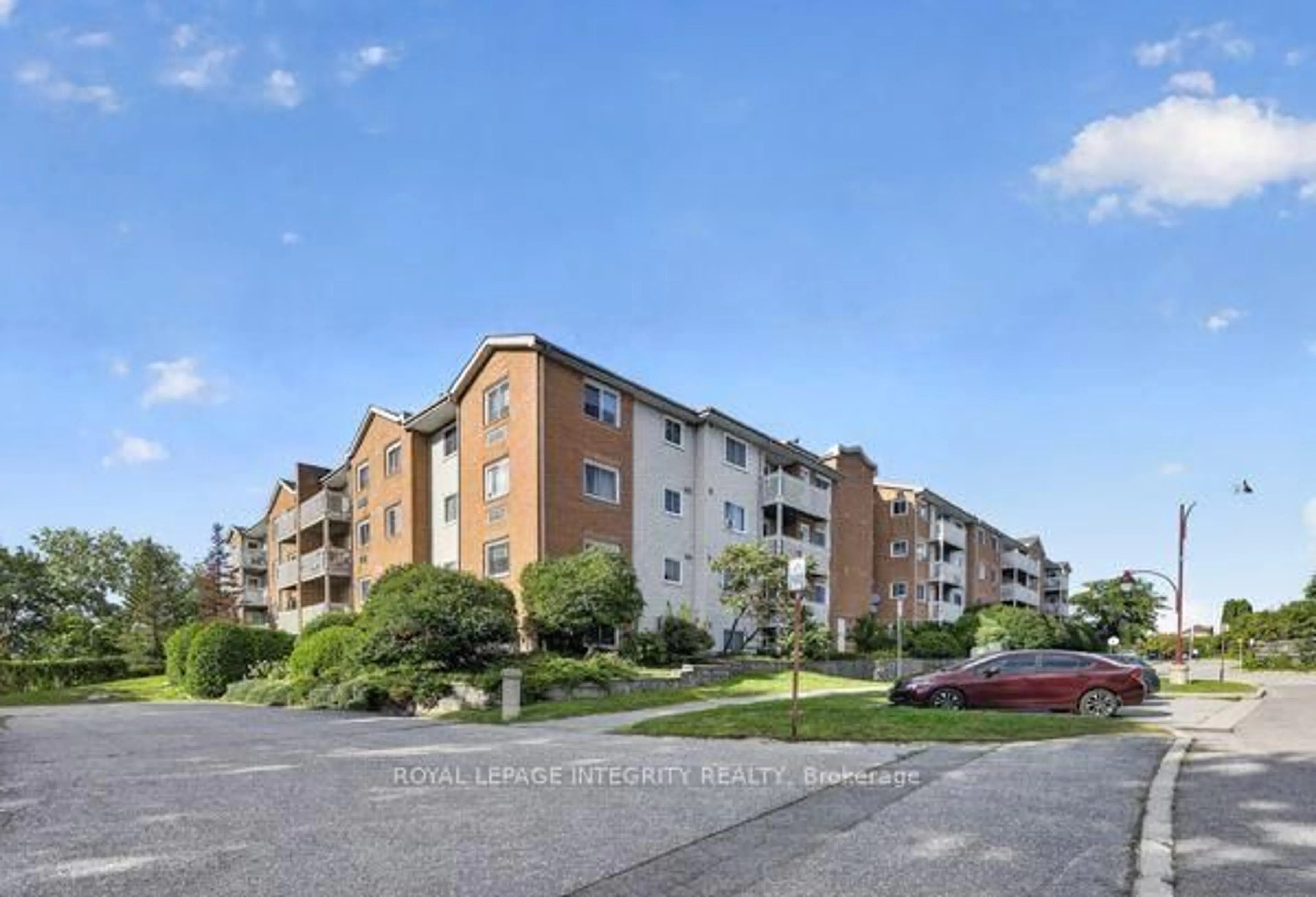 A pic from outside/outdoor area/front of a property/back of a property/a pic from drone, street for 345 Centrum Blvd #404, Ottawa Ontario K1E 3W9
