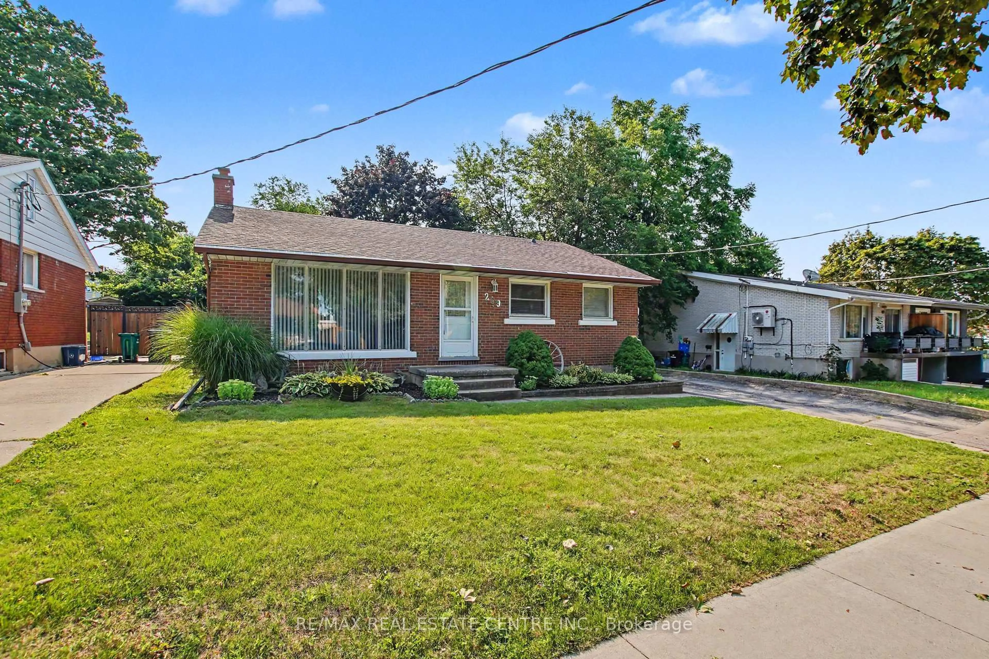 Home with brick exterior material, street for 209 Franklin St, Kitchener Ontario N2C 1R8