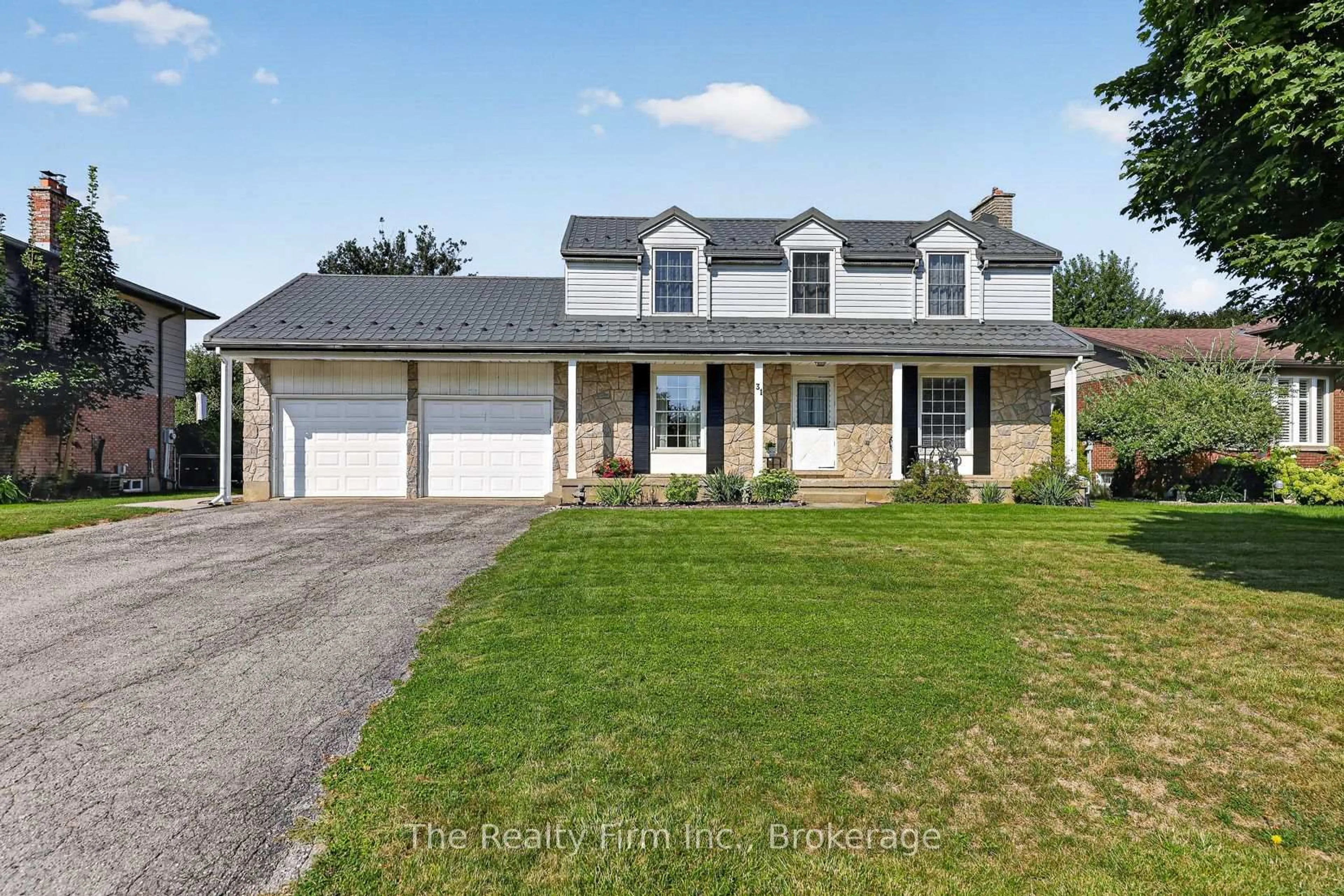 A pic from outside/outdoor area/front of a property/back of a property/a pic from drone, street for 31 Marshall Dr, Norwich Ontario N0J 1P0