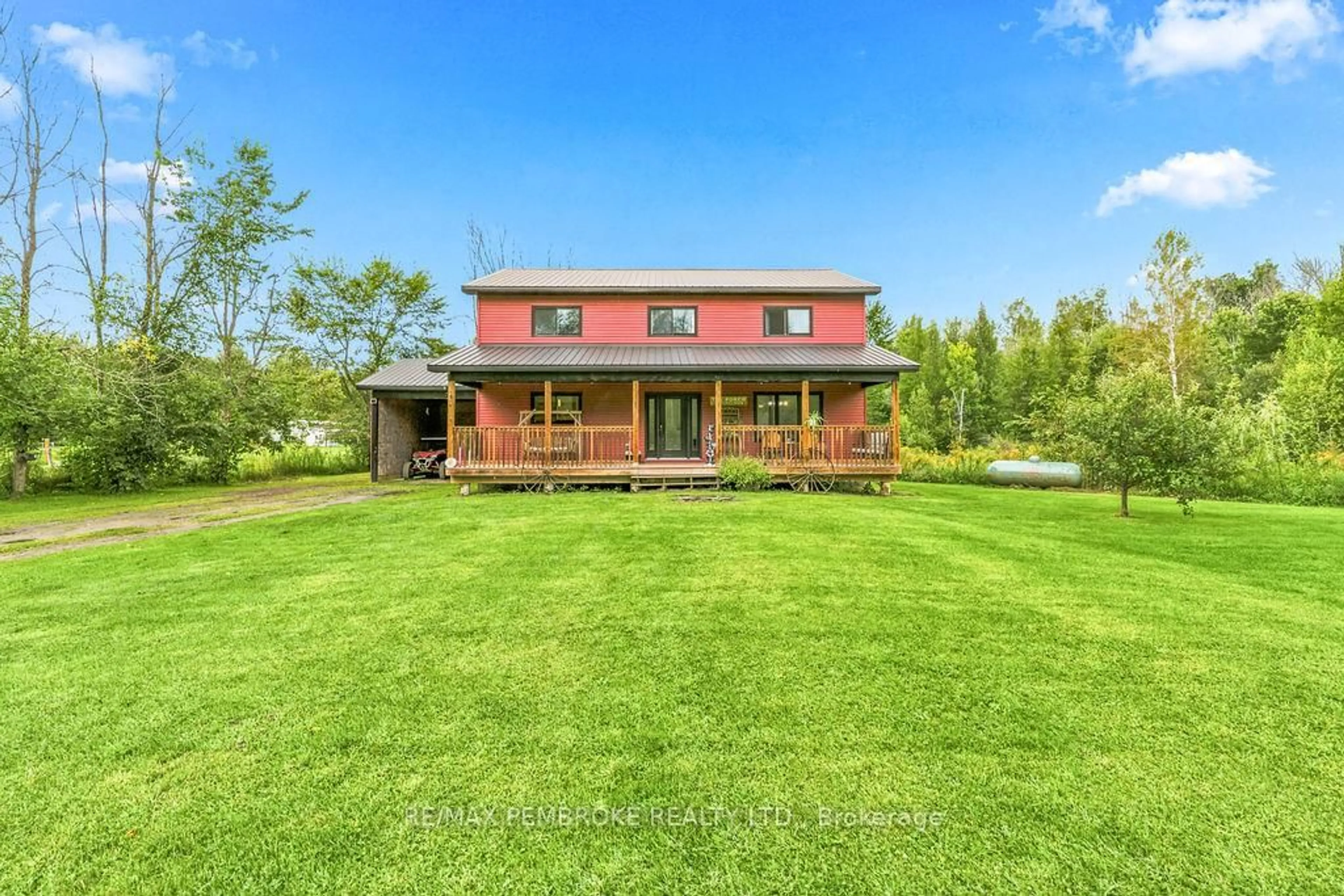 A pic from outside/outdoor area/front of a property/back of a property/a pic from drone, building for 407 Latimer Rd, North Grenville Ontario K0E 1W0