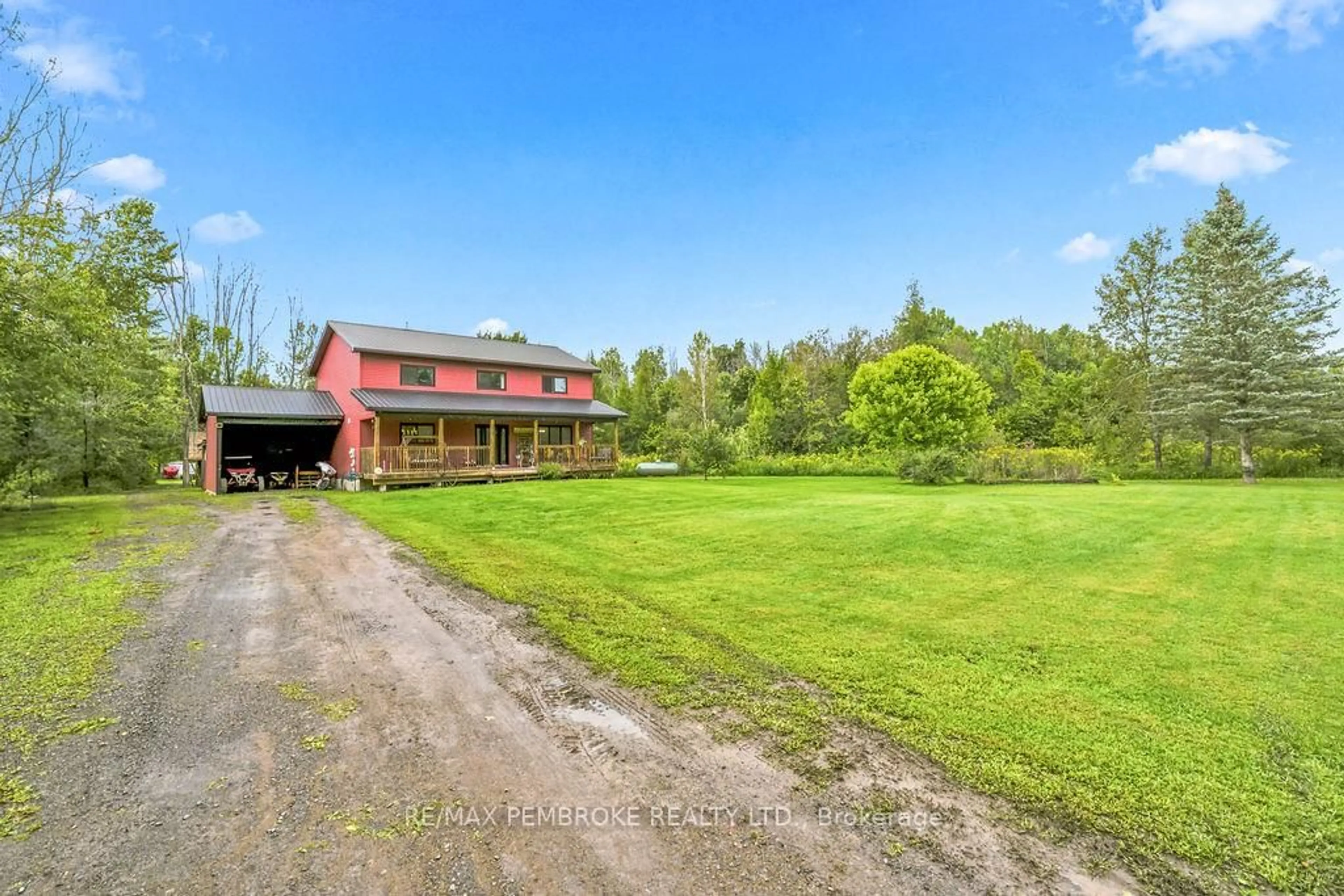 A pic from outside/outdoor area/front of a property/back of a property/a pic from drone, unknown for 407 Latimer Rd, North Grenville Ontario K0E 1W0
