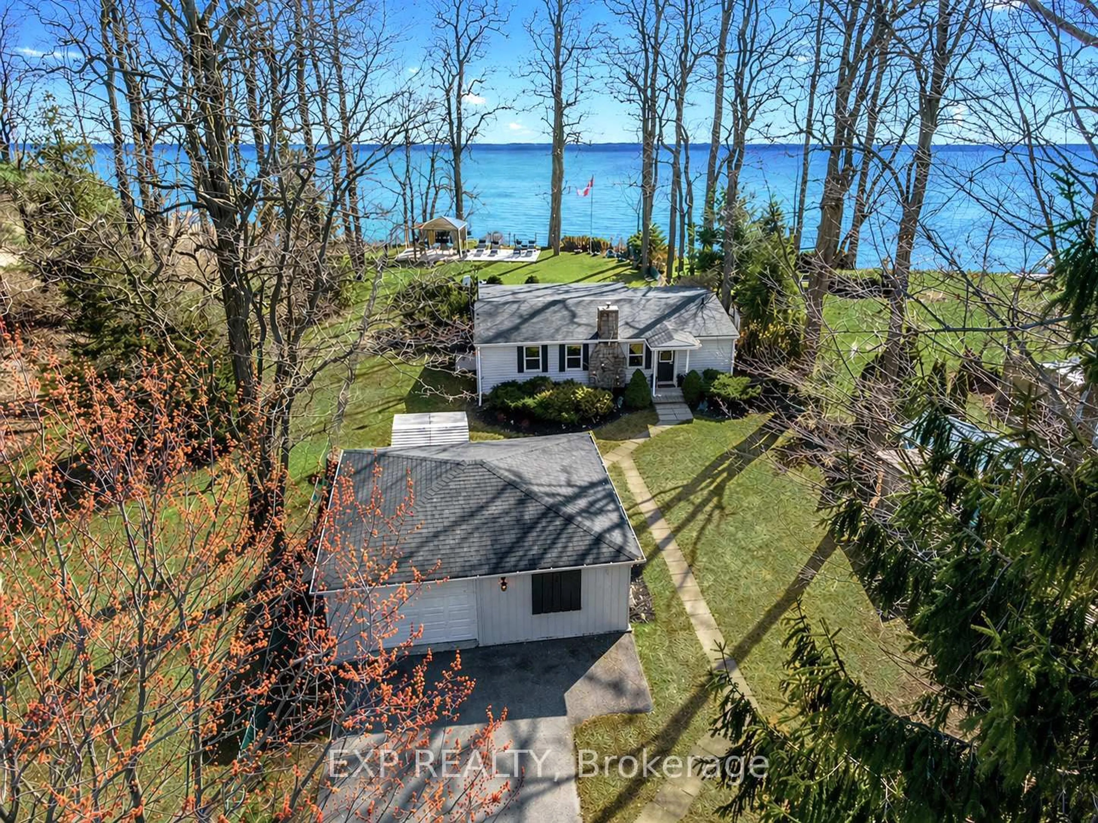 A pic from outside/outdoor area/front of a property/back of a property/a pic from drone, water/lake/river/ocean view for 113 Victoria Beach Rd, Cramahe Ontario K0K 1S0