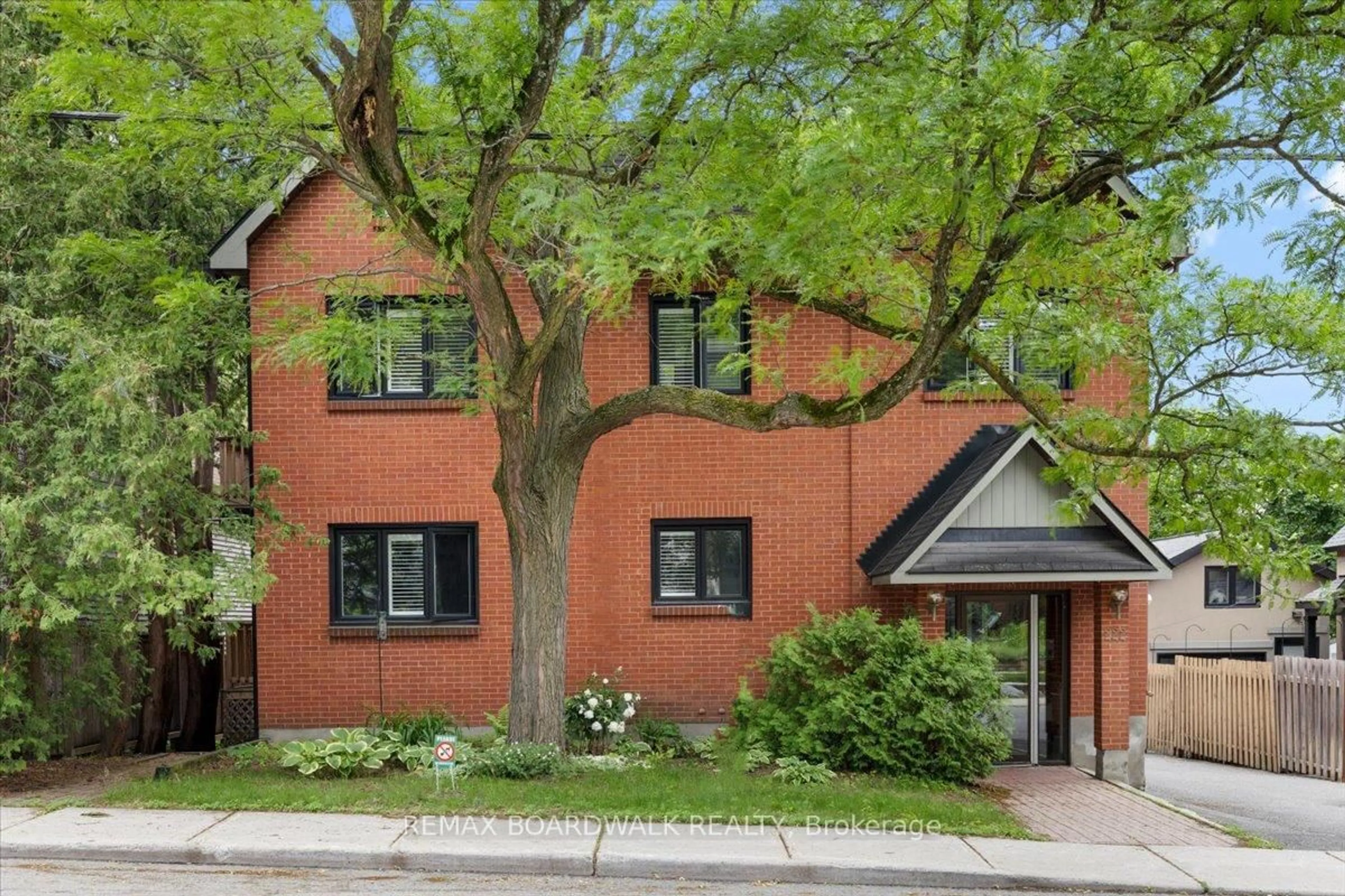 Home with brick exterior material, street for 222 Russell Ave #304, Ottawa Ontario K1N 7X5