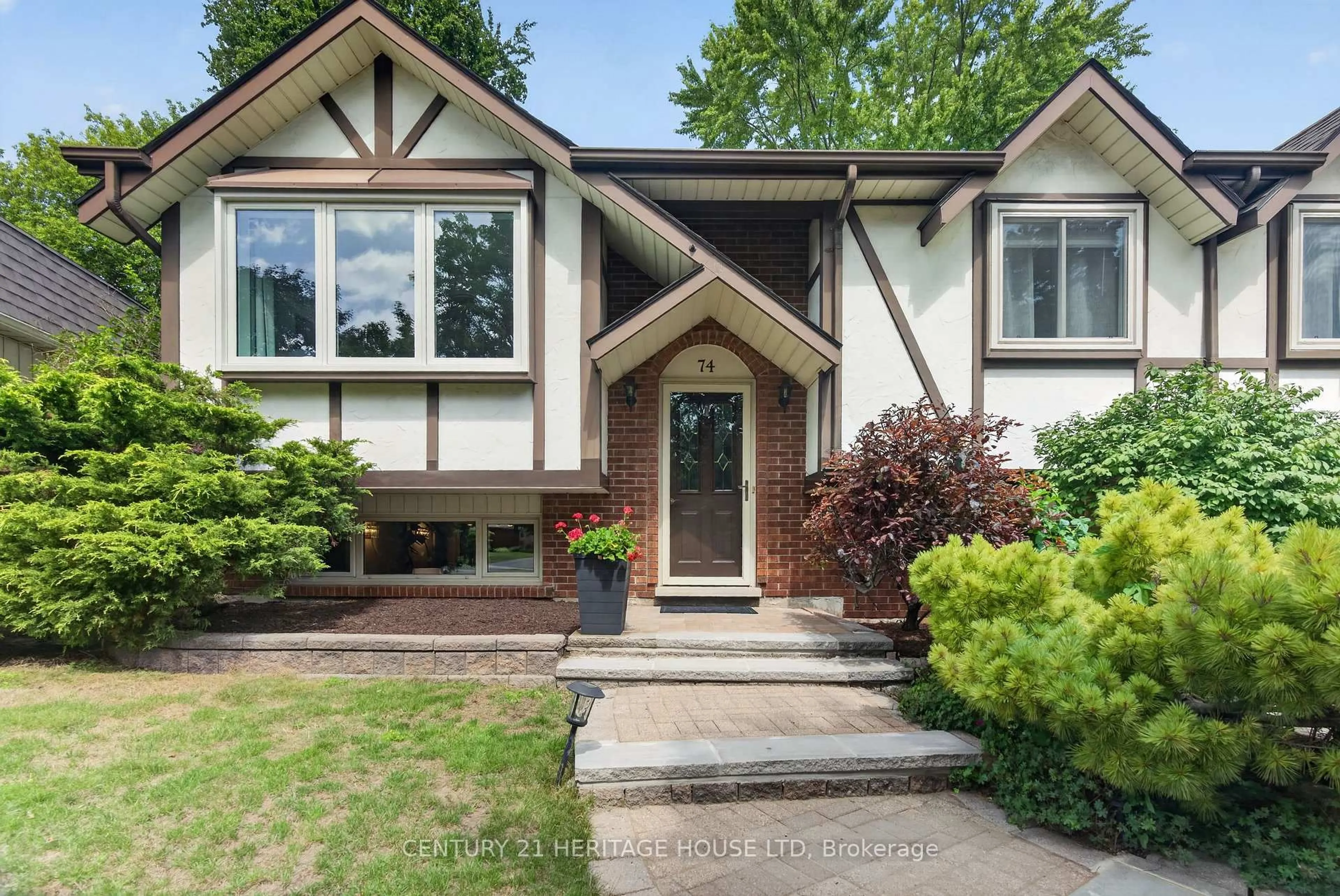 Home with brick exterior material, street for 74 Cherry Hill Dr, Kitchener Ontario N2E 1N6