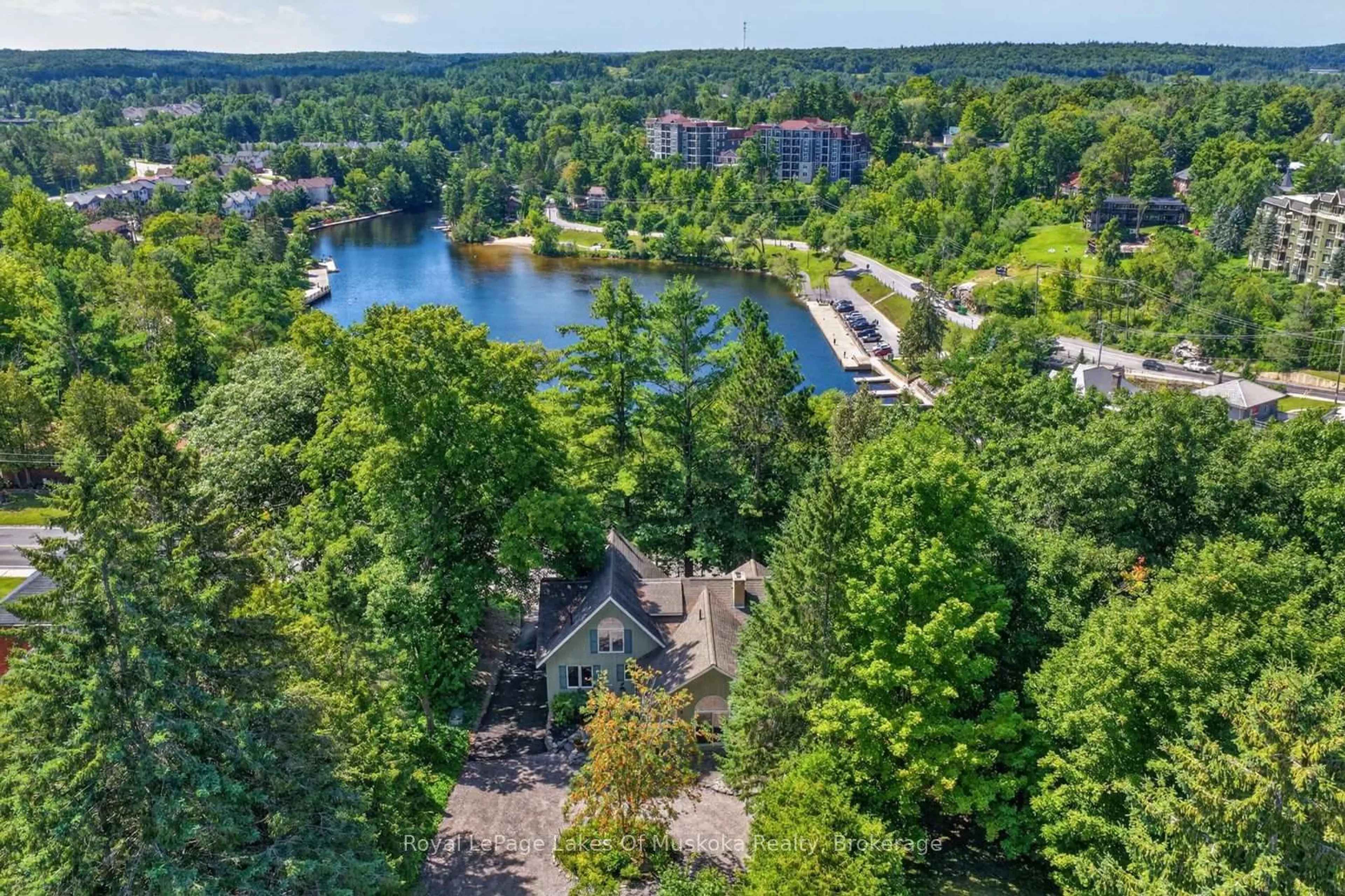 A pic from outside/outdoor area/front of a property/back of a property/a pic from drone, water/lake/river/ocean view for 40 Entrance Dr, Bracebridge Ontario P1L 1H2