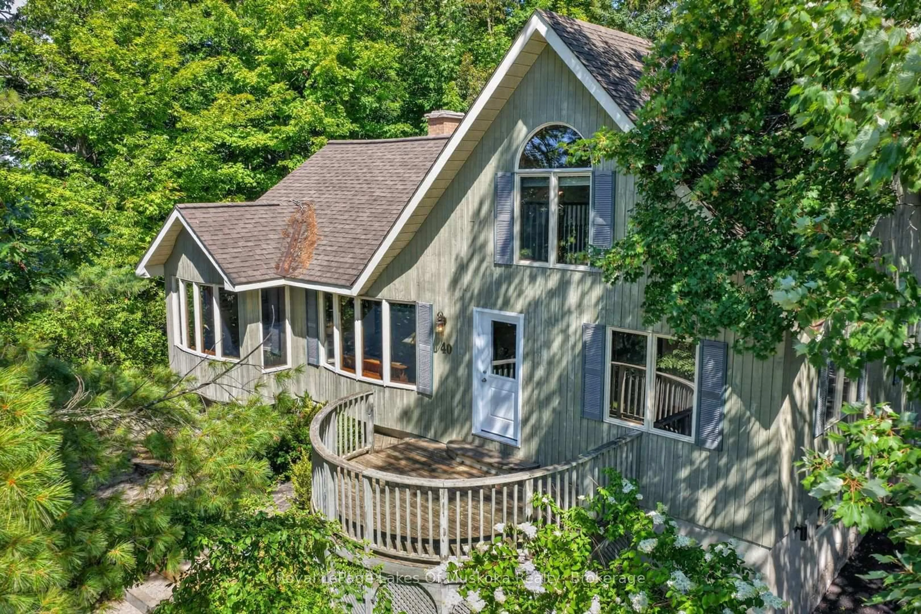 A pic from outside/outdoor area/front of a property/back of a property/a pic from drone, water/lake/river/ocean view for 40 Entrance Dr, Bracebridge Ontario P1L 1H2
