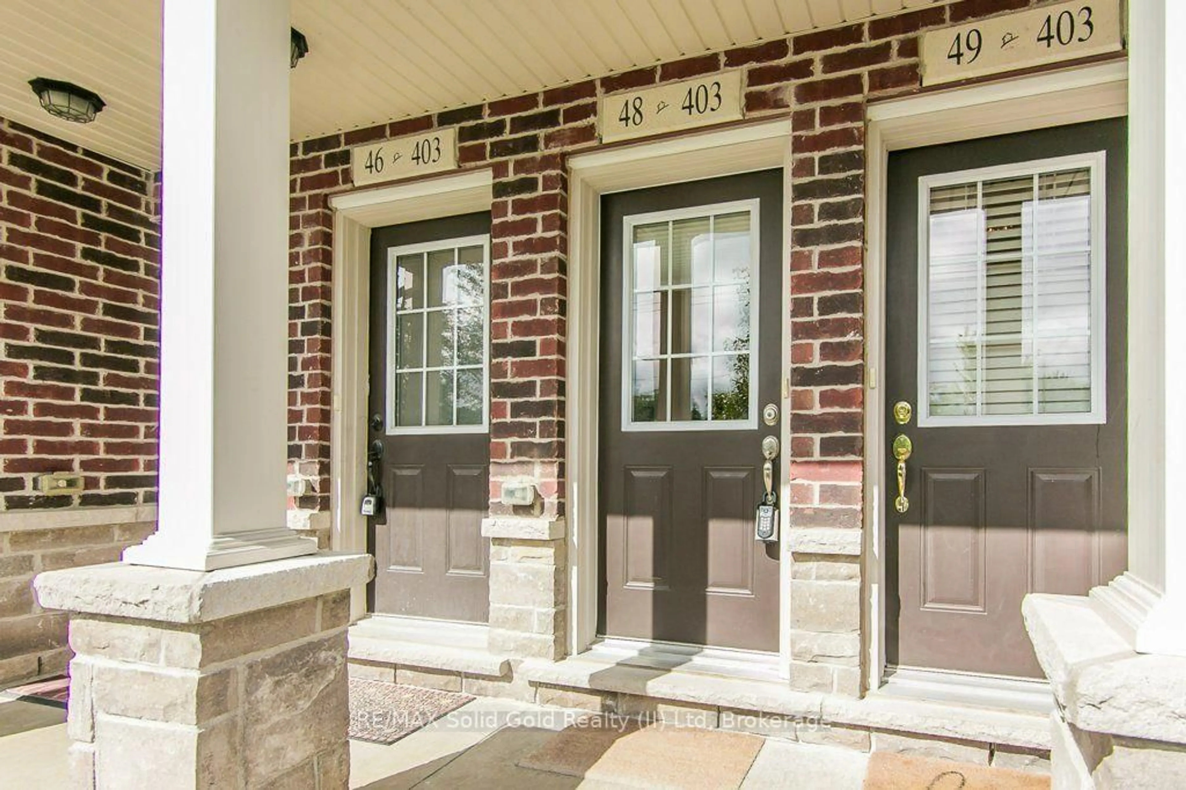 Home with brick exterior material, street for 403 Westwood Dr #48, Kitchener Ontario N2M 0B5