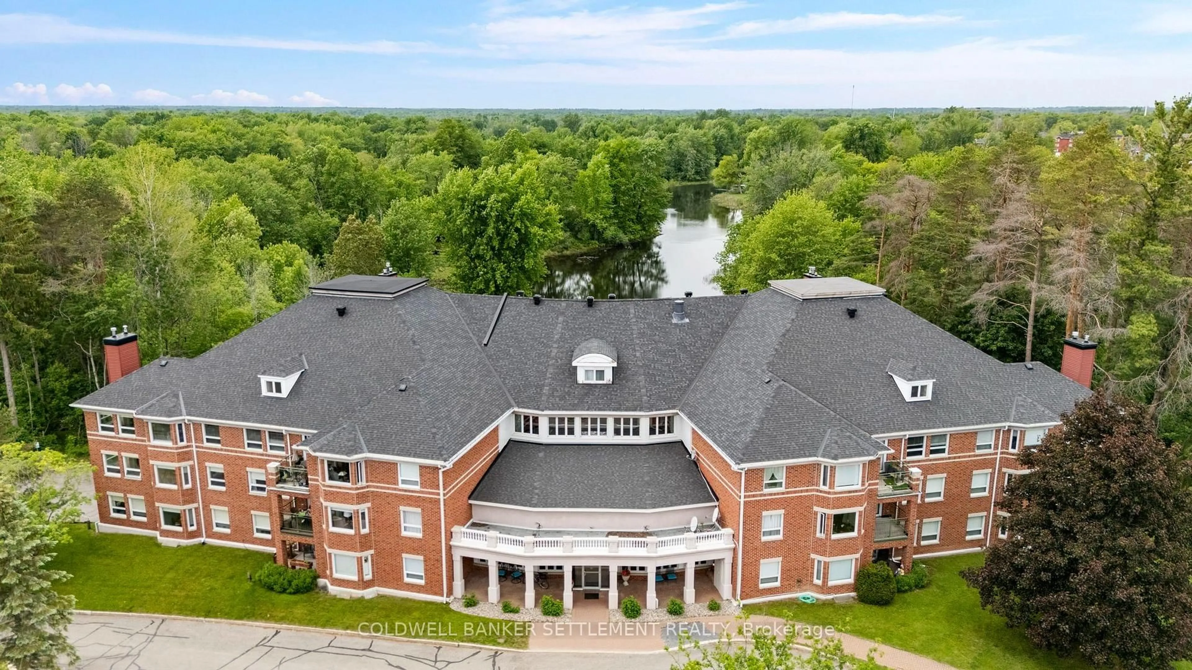 A pic from outside/outdoor area/front of a property/back of a property/a pic from drone, water/lake/river/ocean view for 23 Rogers Rd #207, Perth Ontario K7H 1P2