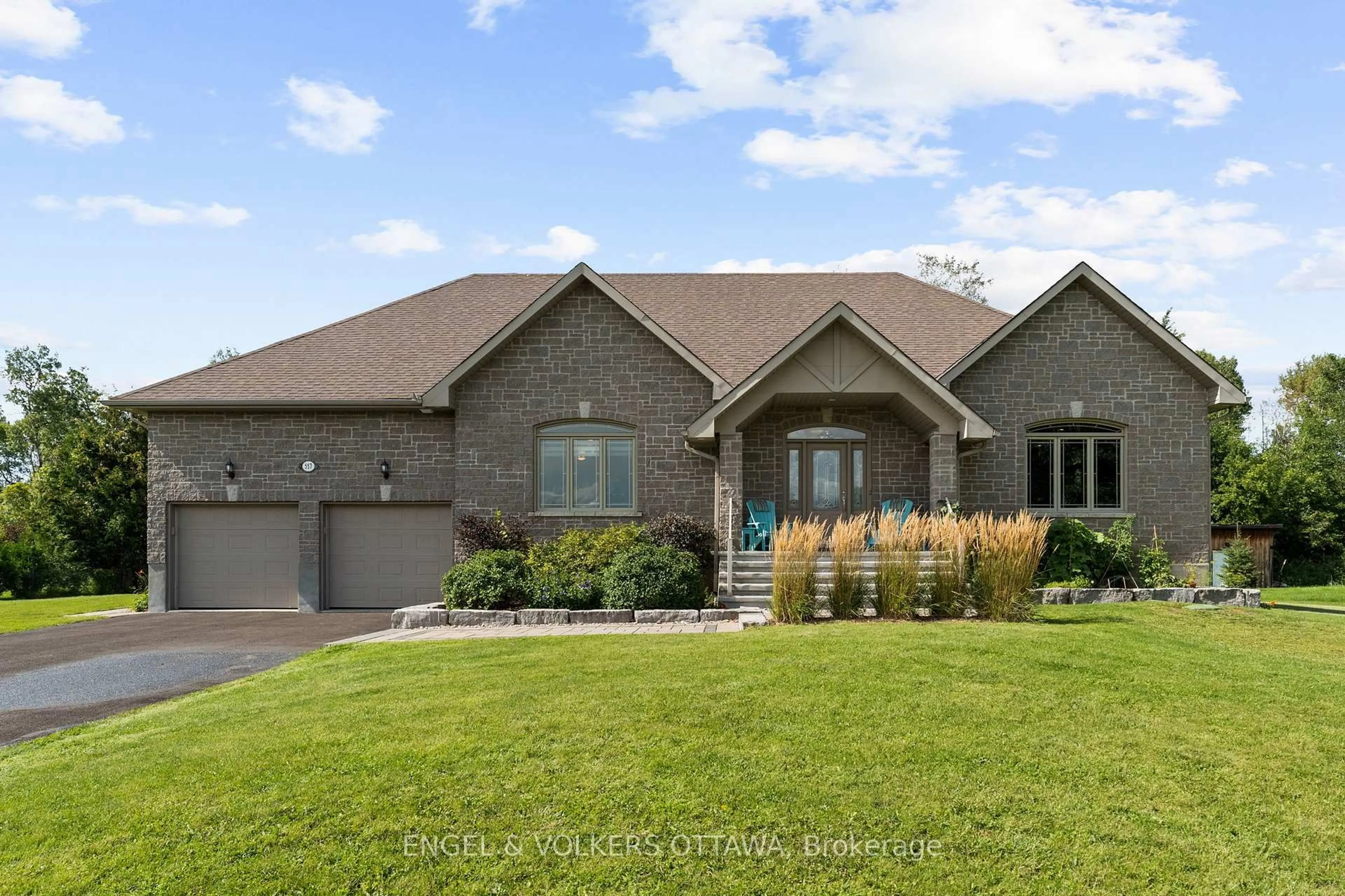 Home with brick exterior material, street for 557 Tullamore St, Ottawa Ontario K1X 0A2