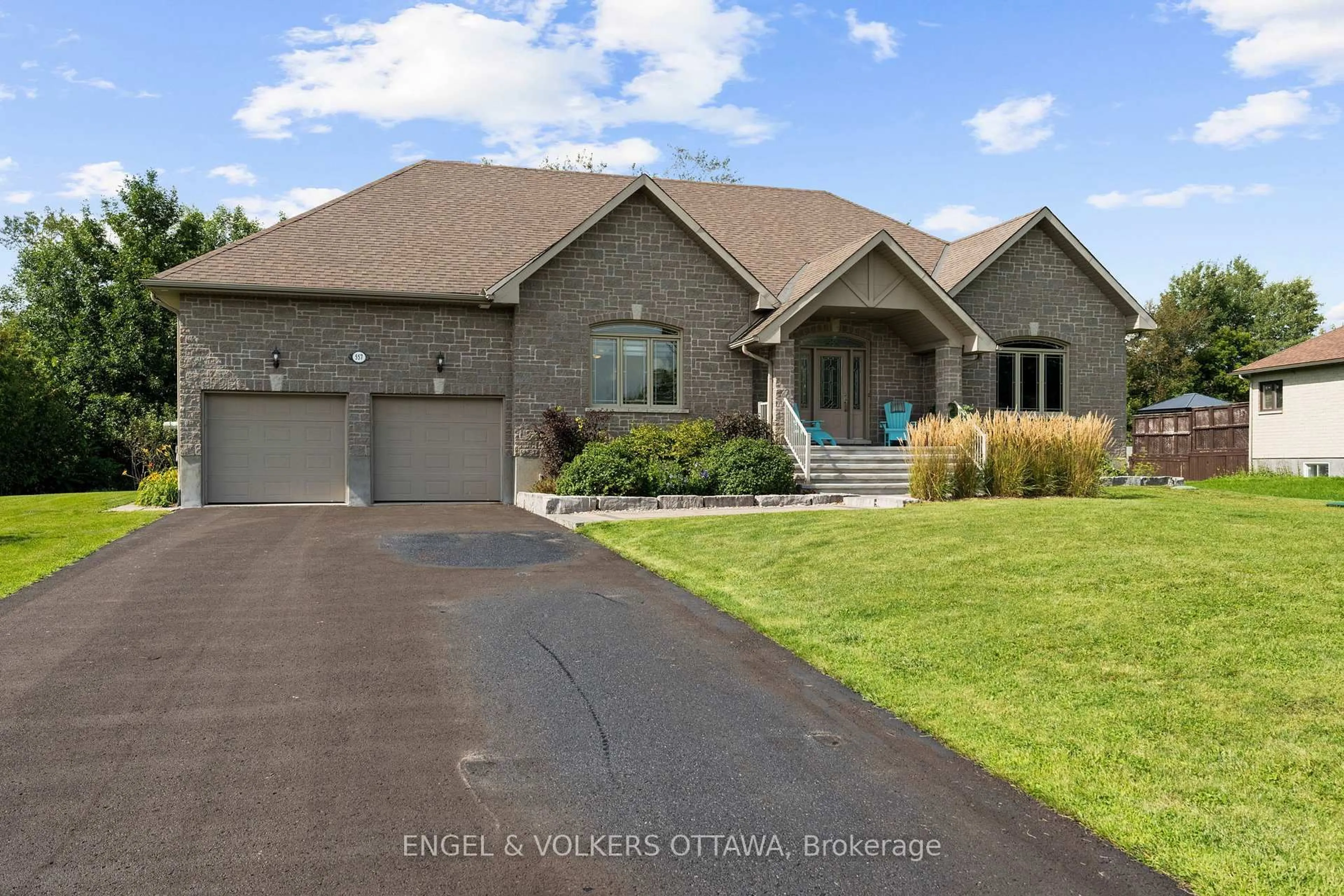 Home with brick exterior material, street for 557 Tullamore St, Ottawa Ontario K1X 0A2