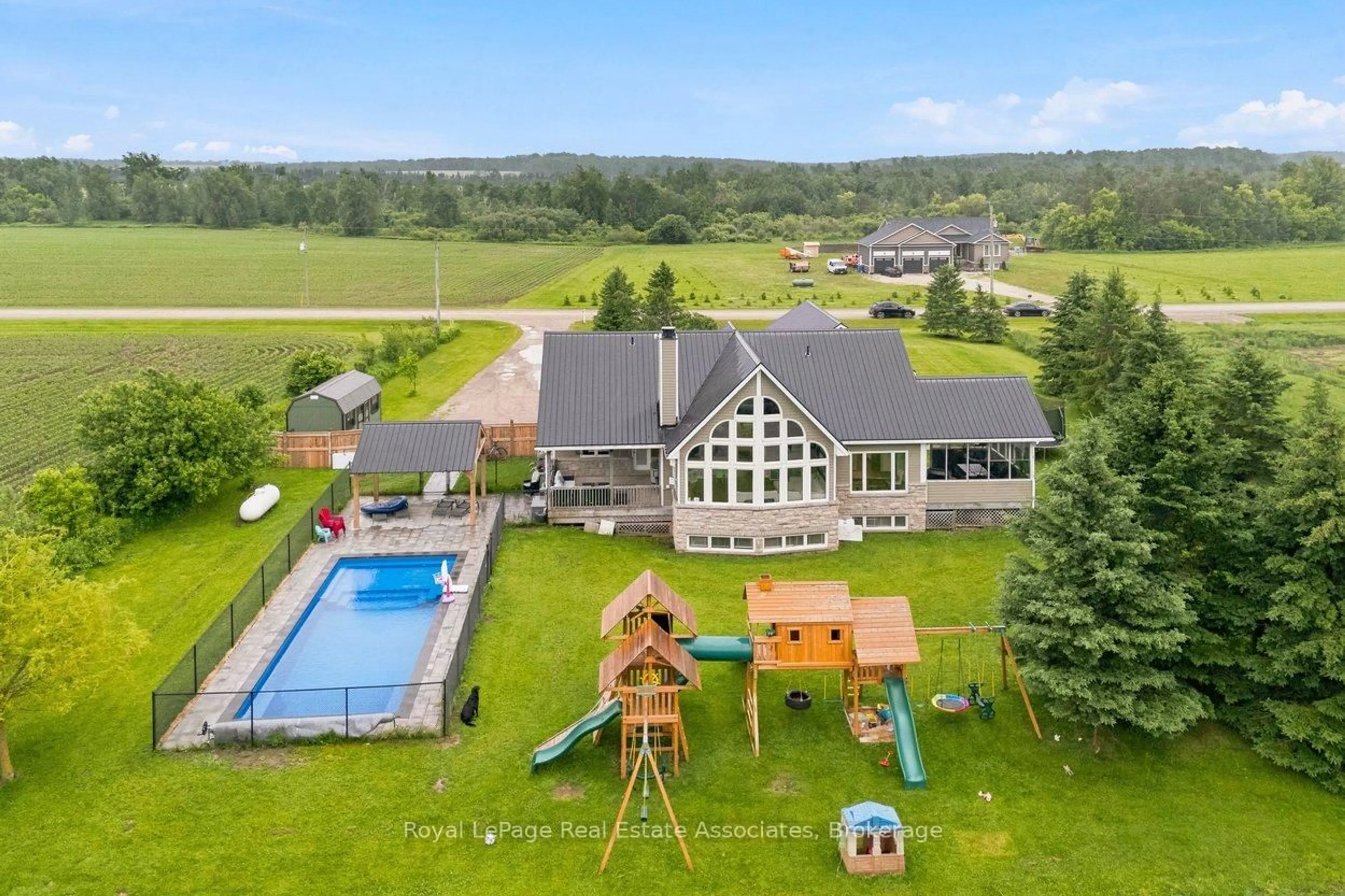 A pic from outside/outdoor area/front of a property/back of a property/a pic from drone, mountain view for 321311 Concession Rd #6-7, East Luther Grand Valley Ontario L9W 0W8