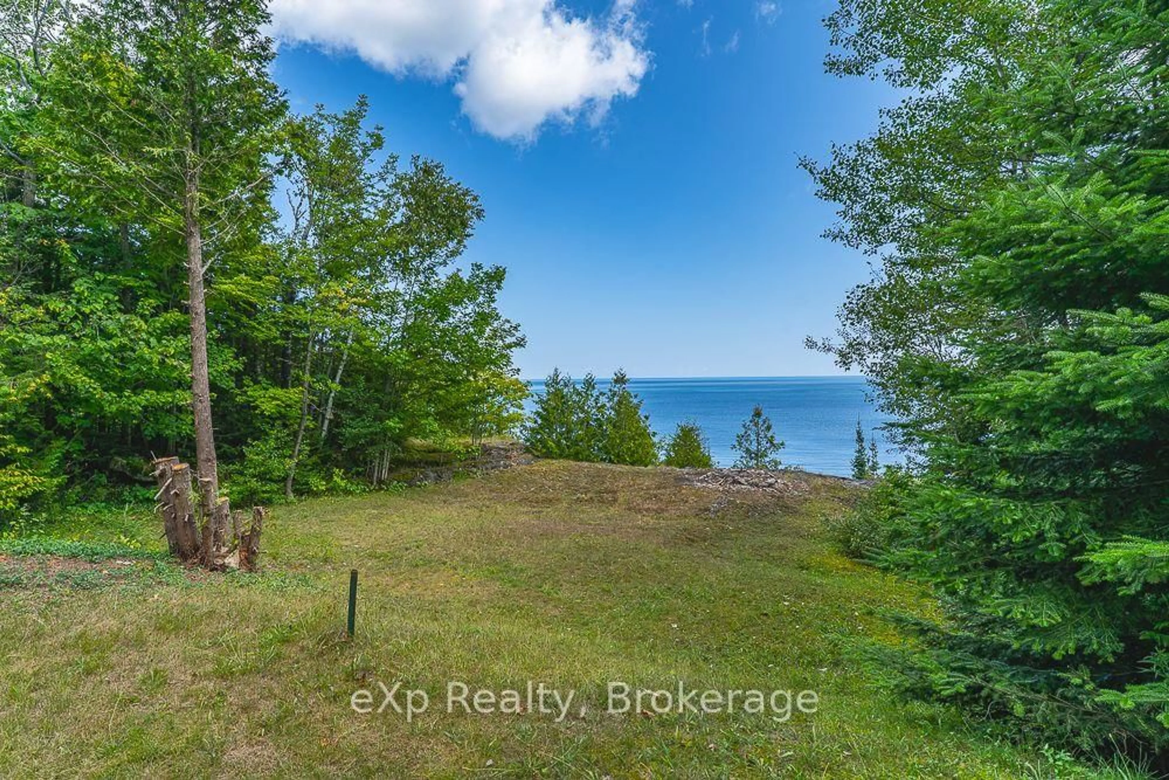 A pic from outside/outdoor area/front of a property/back of a property/a pic from drone, water/lake/river/ocean view for 144 Mckague Rd, Northern Bruce Peninsula Ontario N0H 1W0