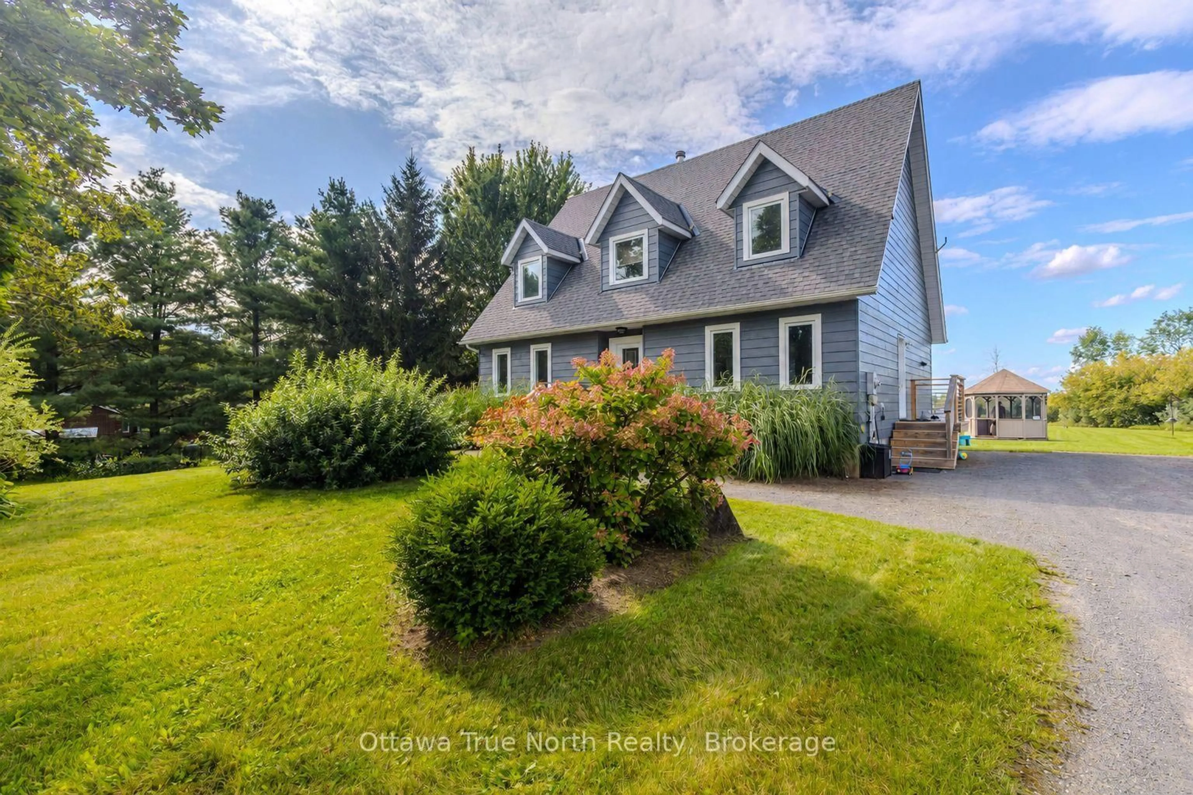 A pic from outside/outdoor area/front of a property/back of a property/a pic from drone, water/lake/river/ocean view for 220 Ninth Line, Carleton Place Ontario K7C 0V9