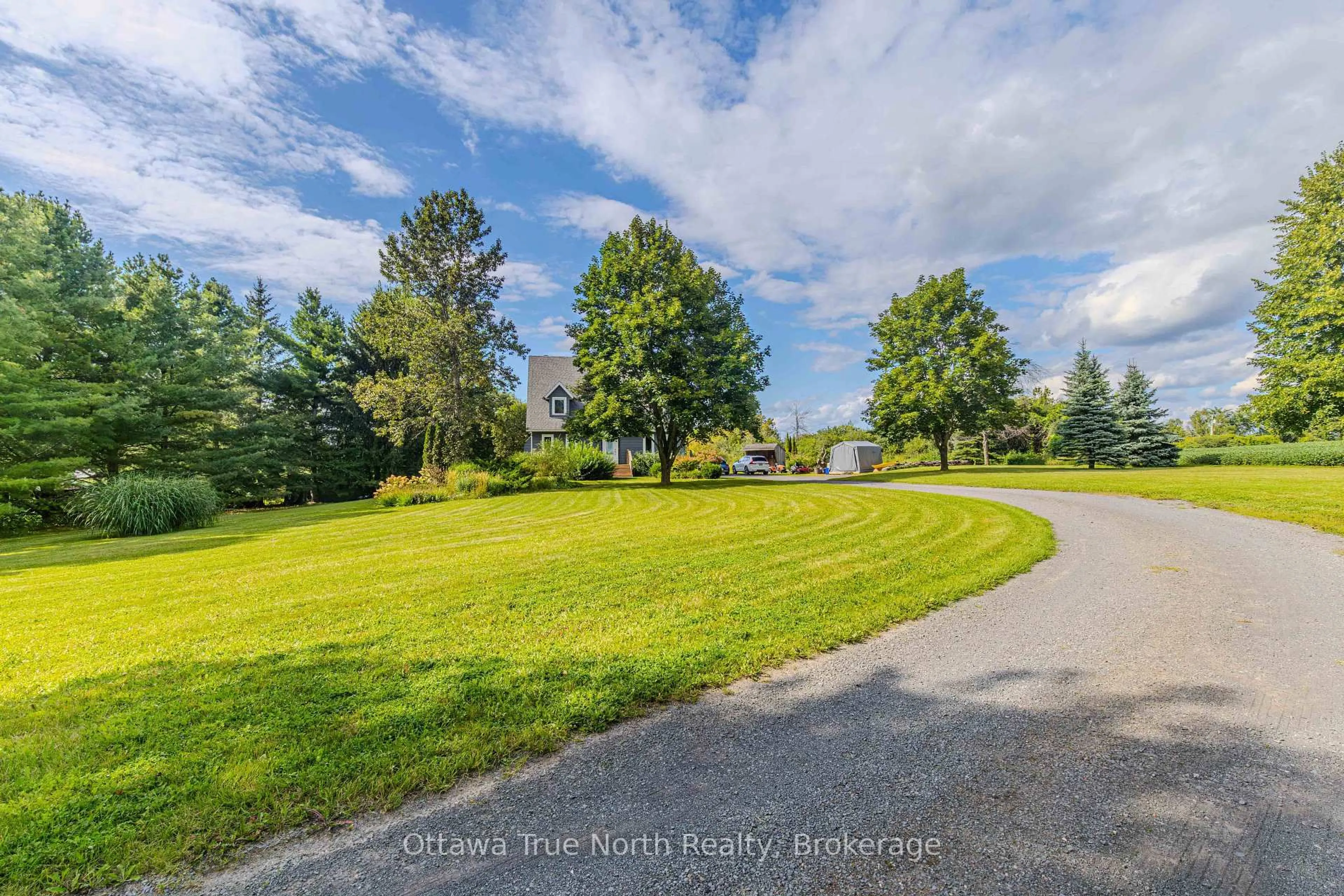 A pic from outside/outdoor area/front of a property/back of a property/a pic from drone, water/lake/river/ocean view for 220 Ninth Line, Carleton Place Ontario K7C 0V9