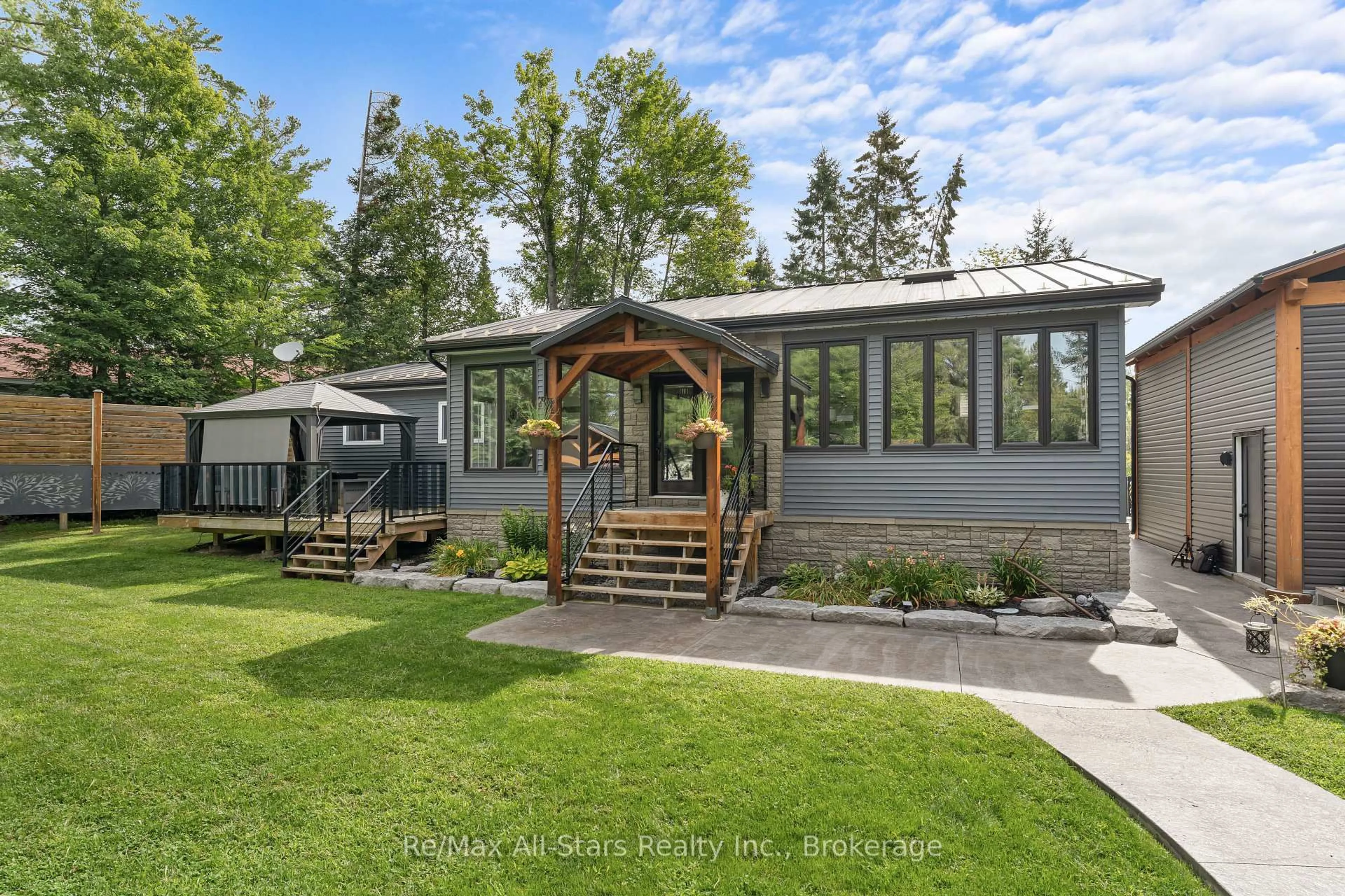 Home with vinyl exterior material, mountain view for 30 River Rd, Kawartha Lakes Ontario K0M 1N0