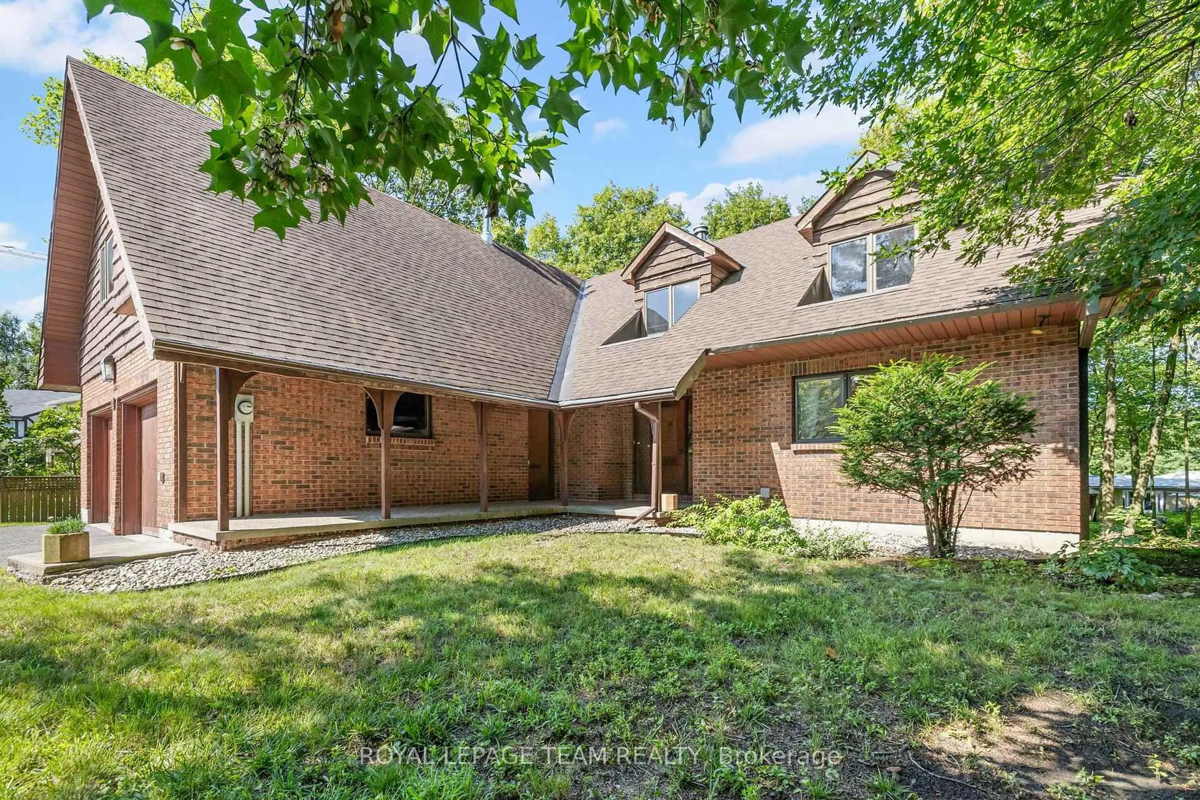 Home with brick exterior material, street for 14 Taunton Pl, Ottawa Ontario K1J 7J6