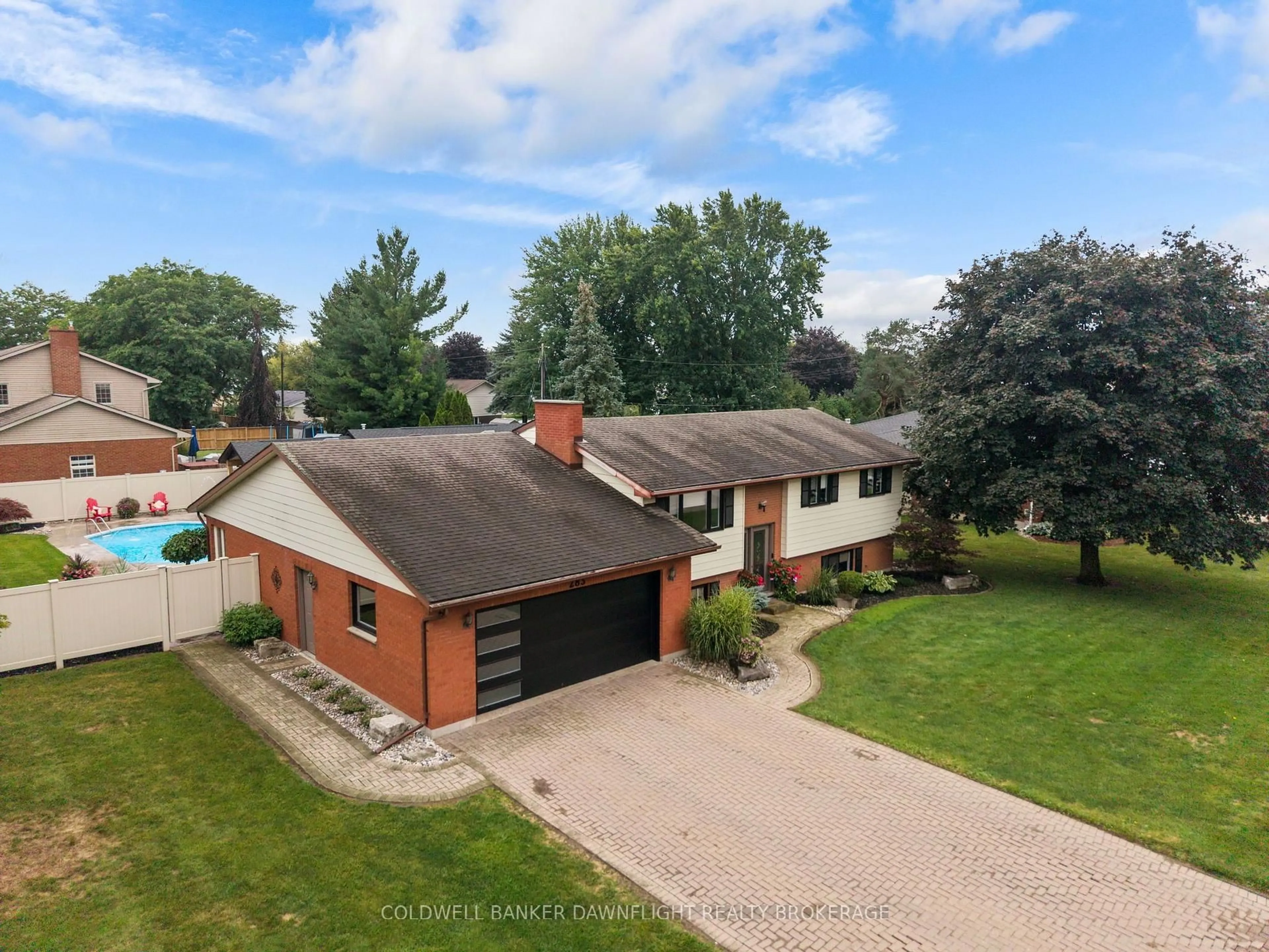 A pic from outside/outdoor area/front of a property/back of a property/a pic from drone, street for 283 Churchill Dr, South Huron Ontario N0M 1S1