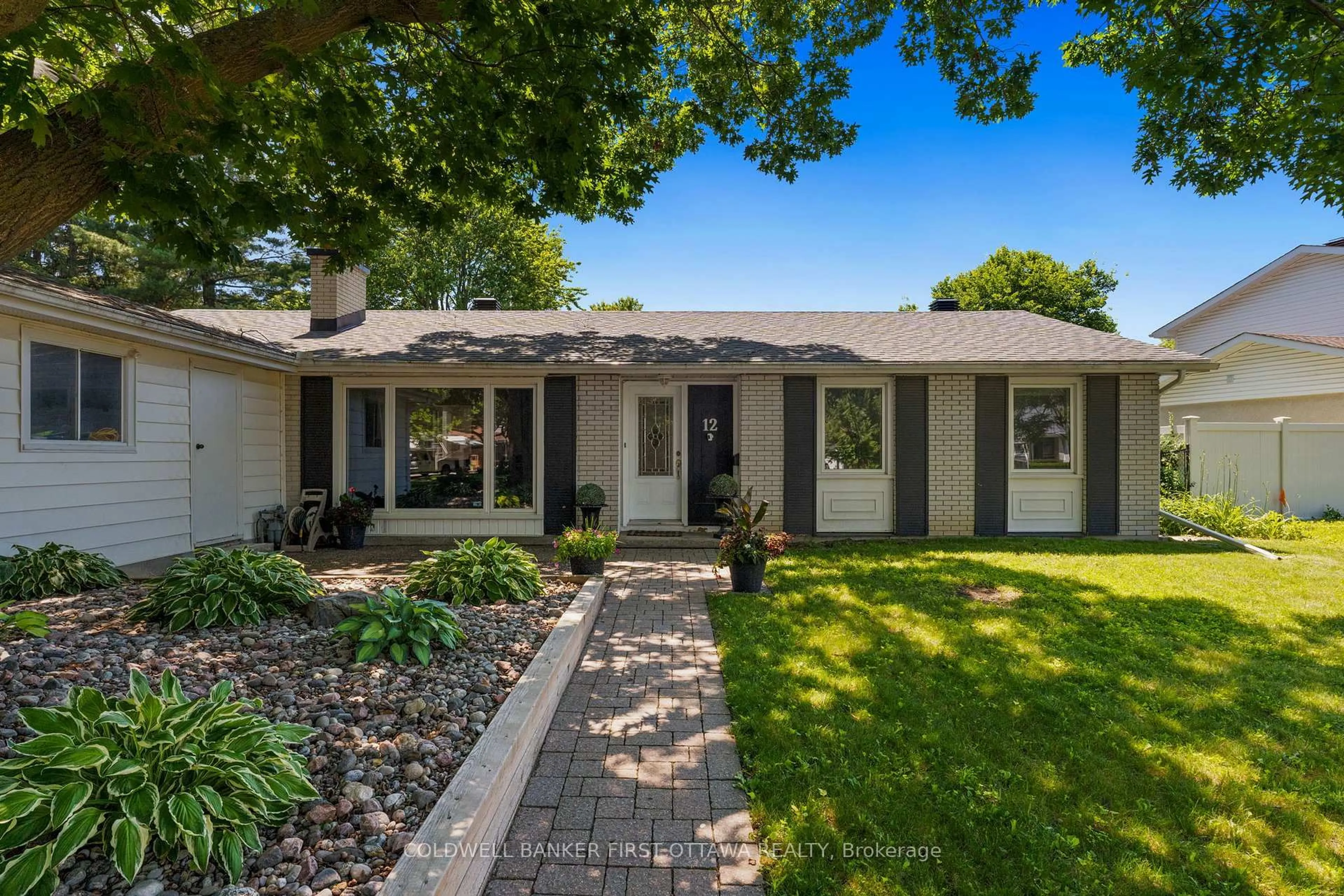 Home with vinyl exterior material, street for 12 Bradgate Dr, Ottawa Ontario K2G 0R6