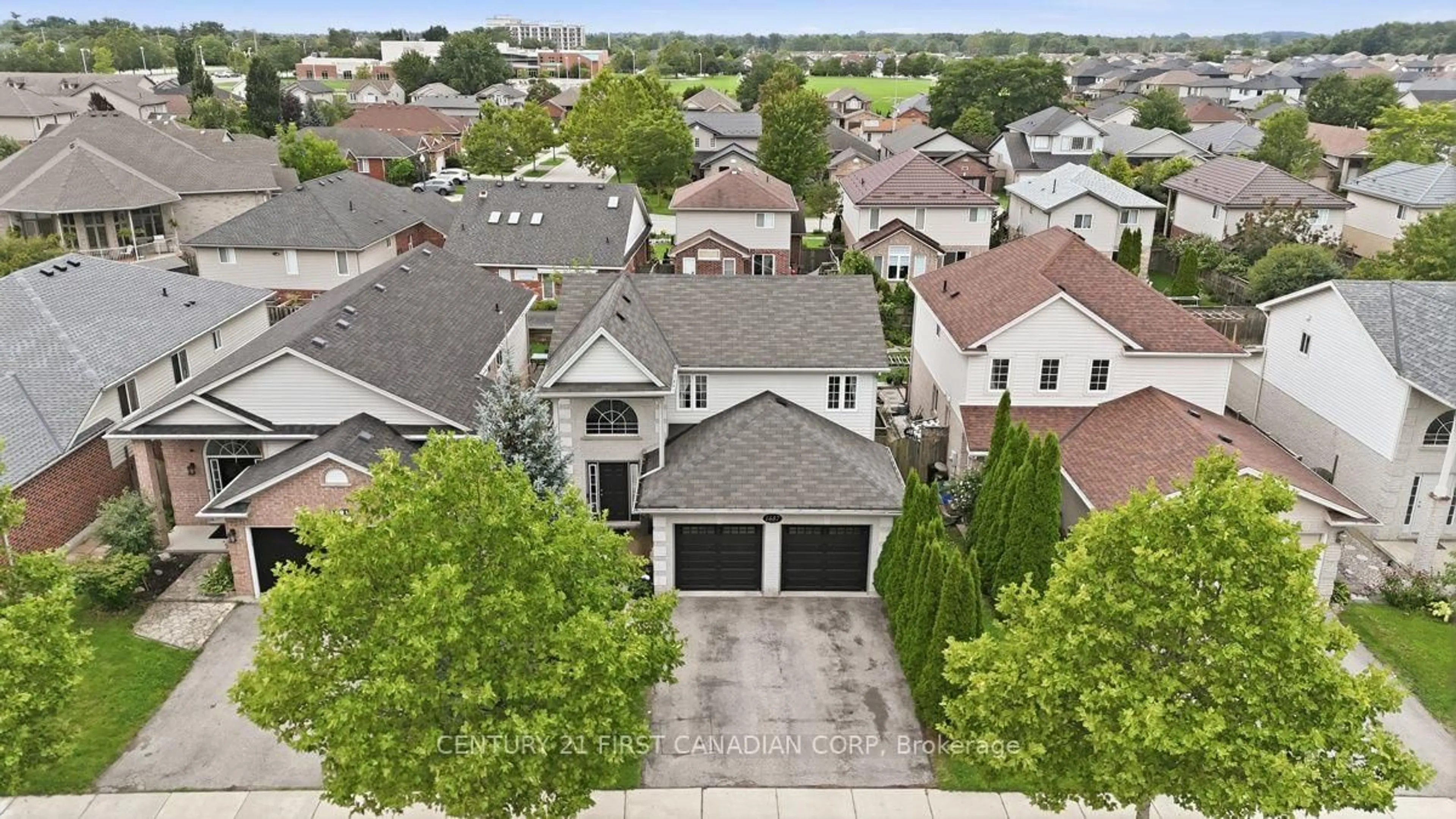 A pic from outside/outdoor area/front of a property/back of a property/a pic from drone, street for 1687 Coronation Dr, London North Ontario N6G 5N7